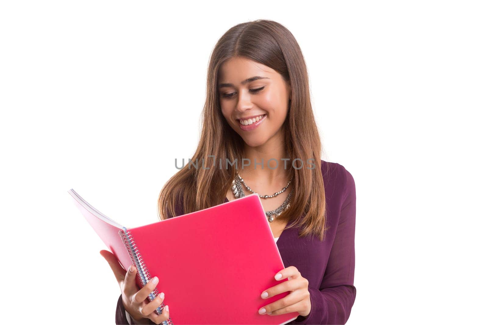 Young student posing over a white background