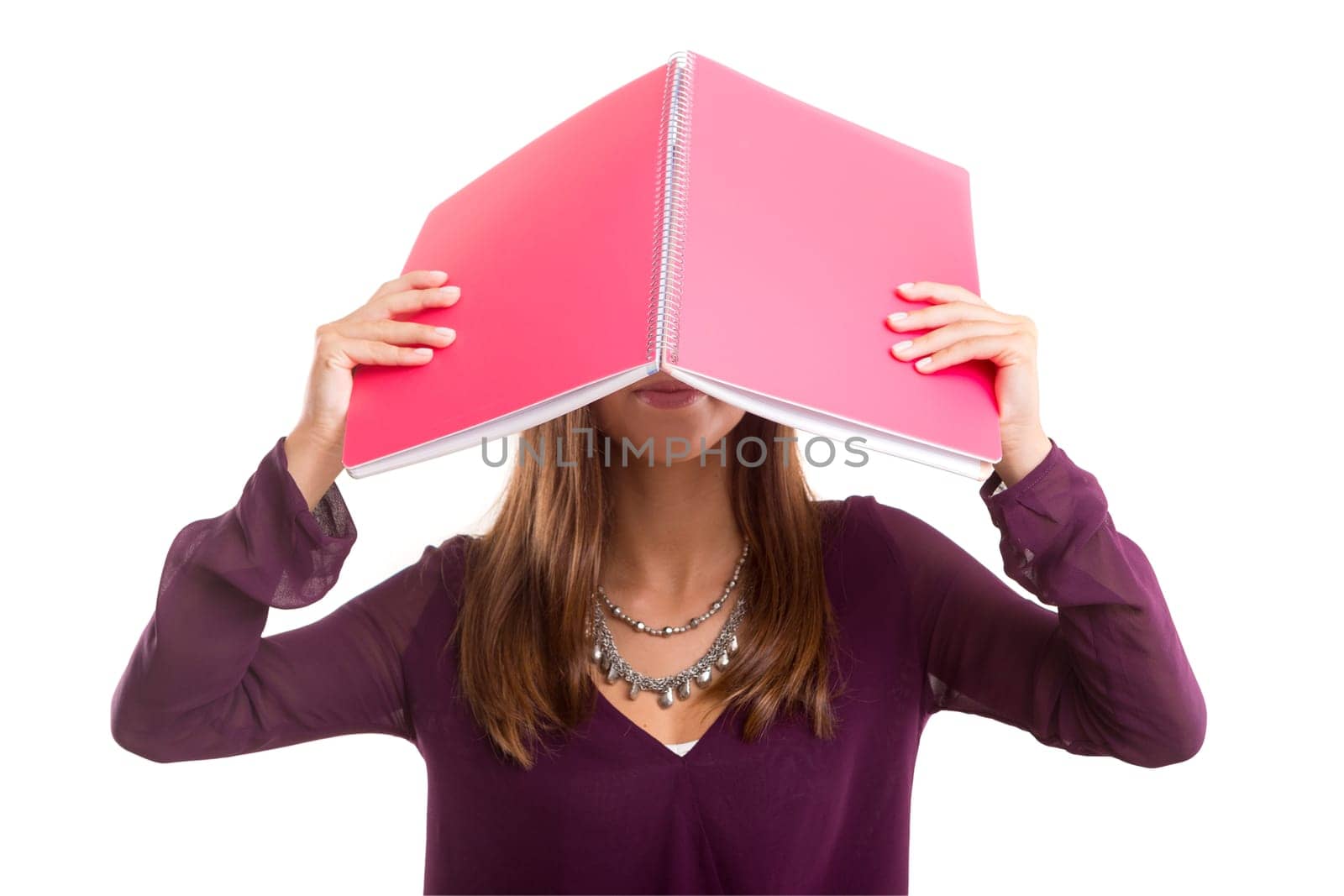 Young student posing over a white background