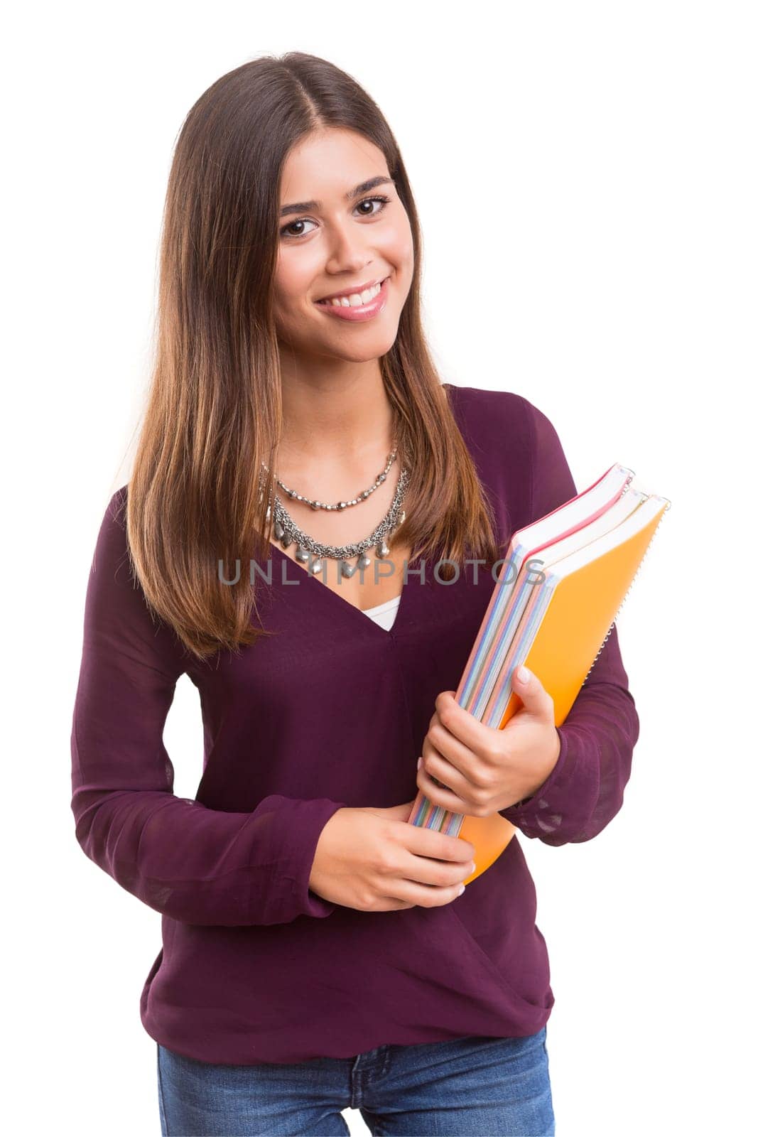 Young student posing over a white background