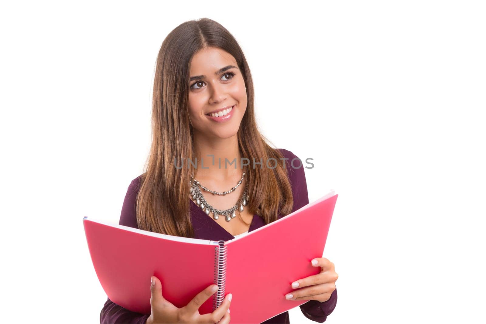 Young student posing over a white background