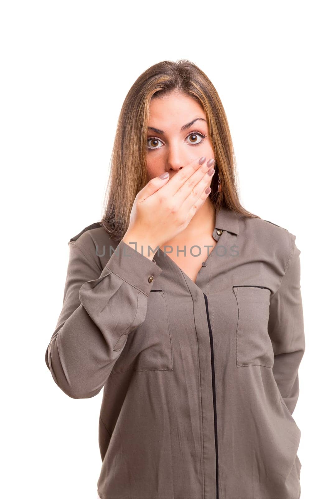 Surprised young woman isolated over white background