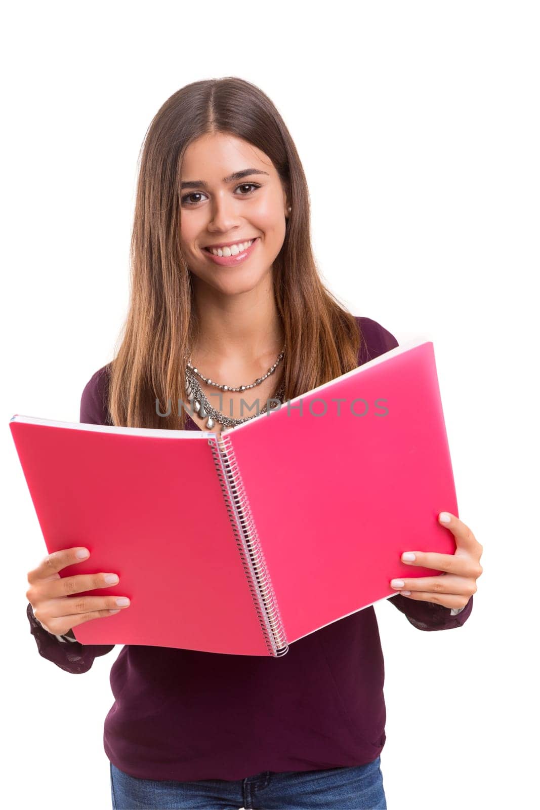 Young student posing over a white background