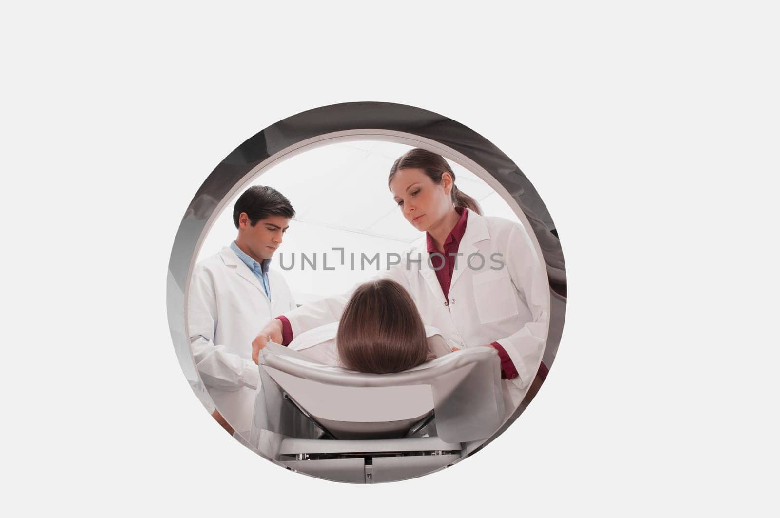 Doctors preparing a patient for MRI scan