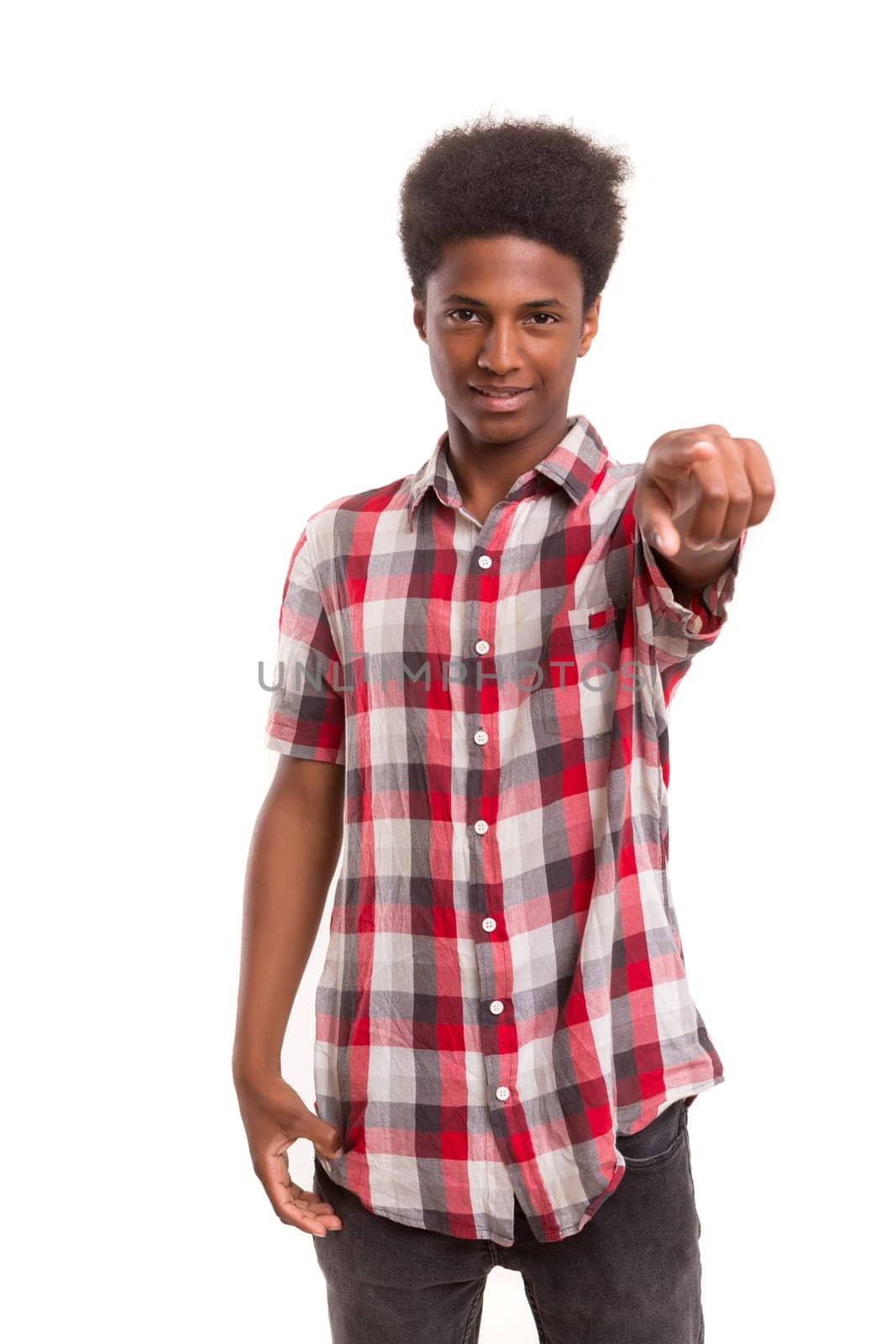 A casual young black boy posing isolated