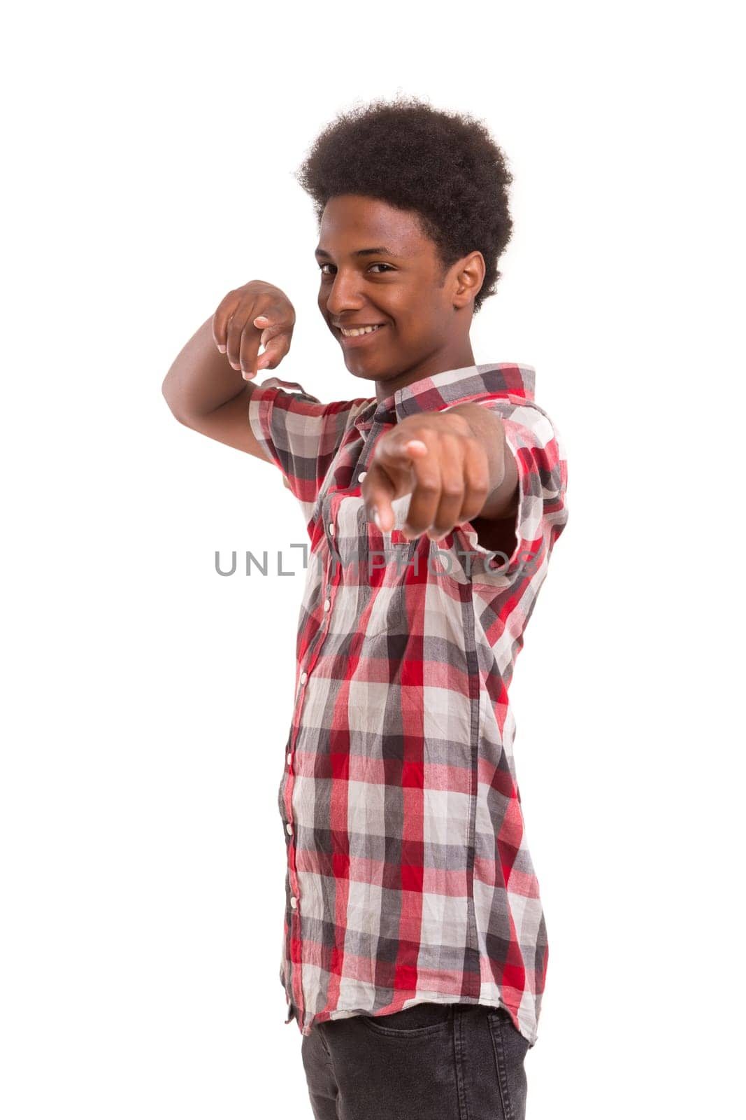 A casual young black boy posing isolated