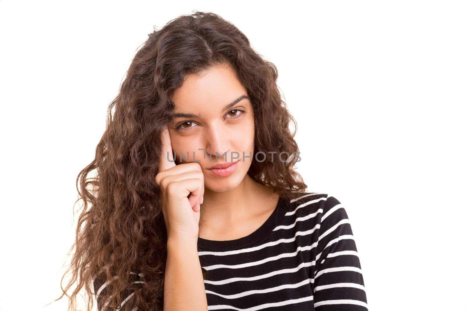 Studio shot: Young woman having a great idea