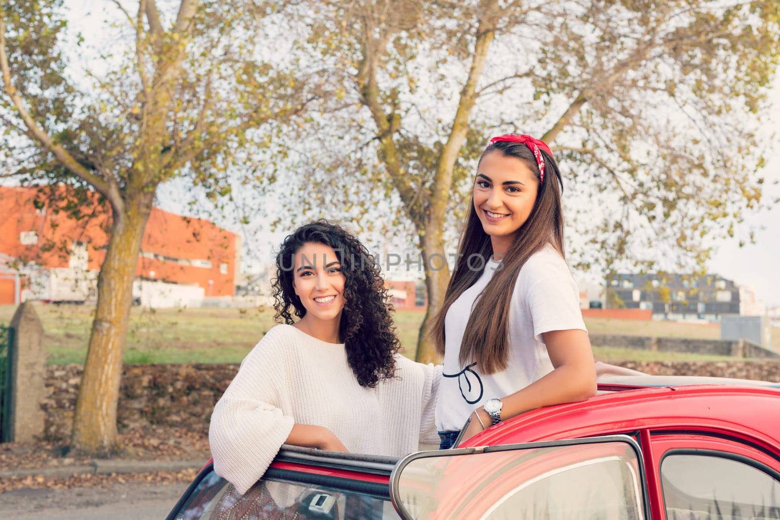 Two friends going on a roadtrip through countryside