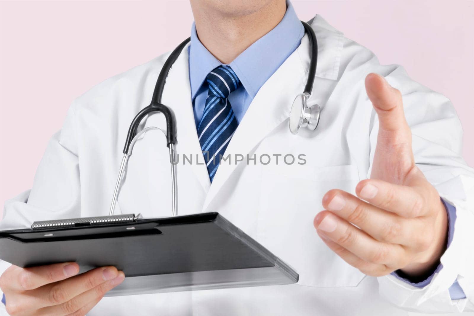 Close_up of a doctor holding a clipboard