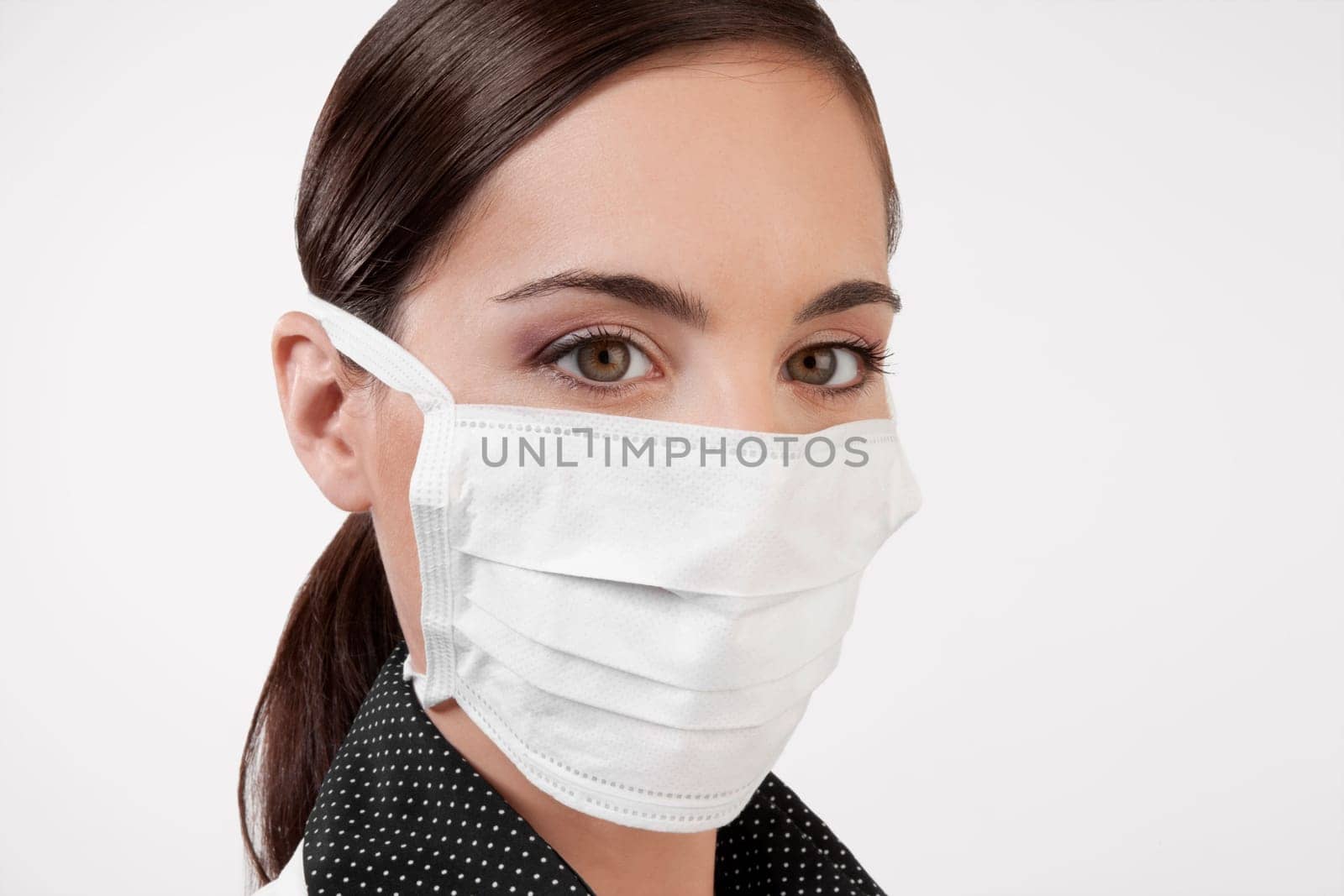 Female doctor wearing a flu mask
