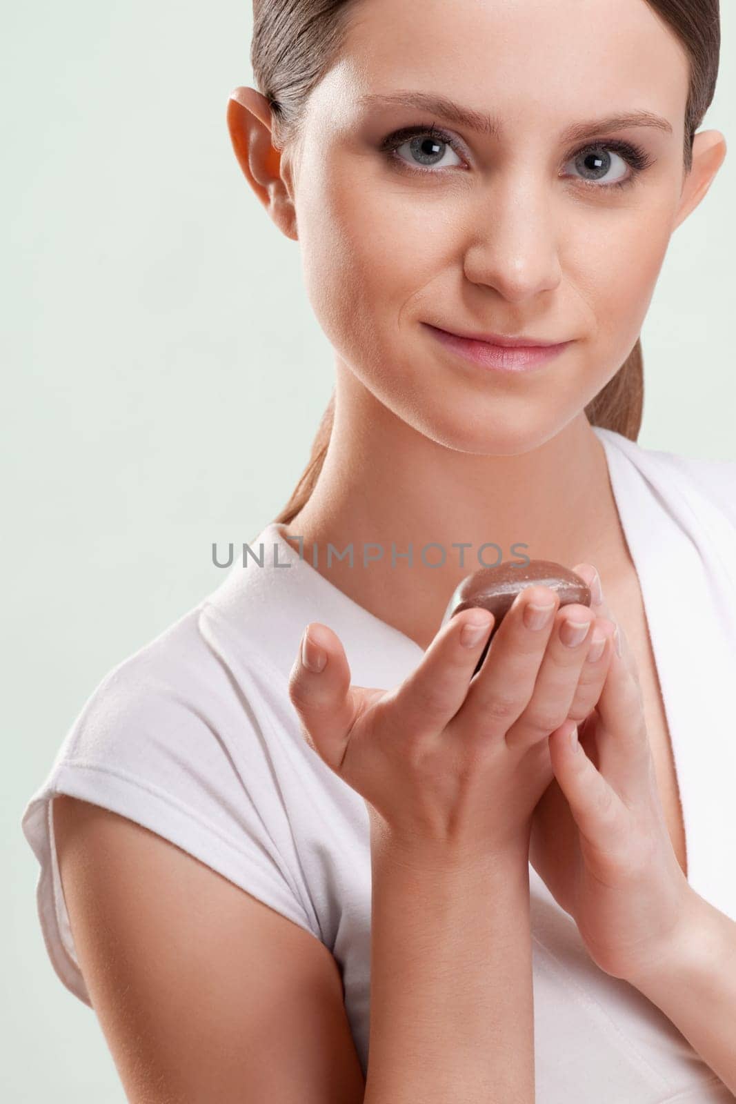 Woman holding a bar of soap