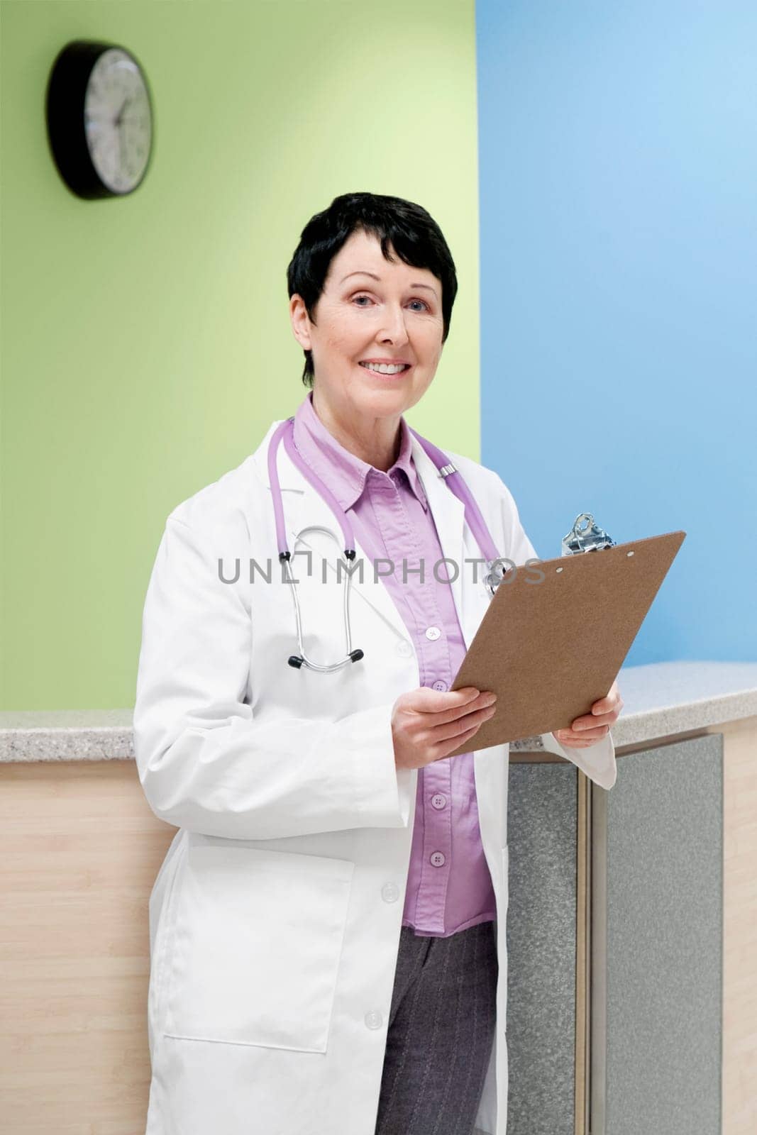Female doctor holding a clipboard