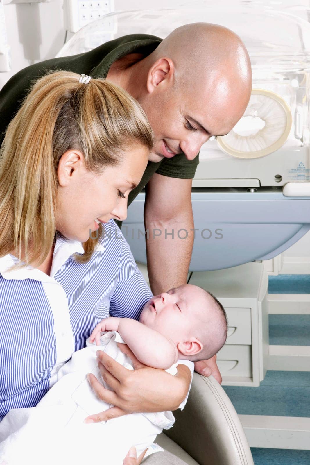 Couple with their newborn baby