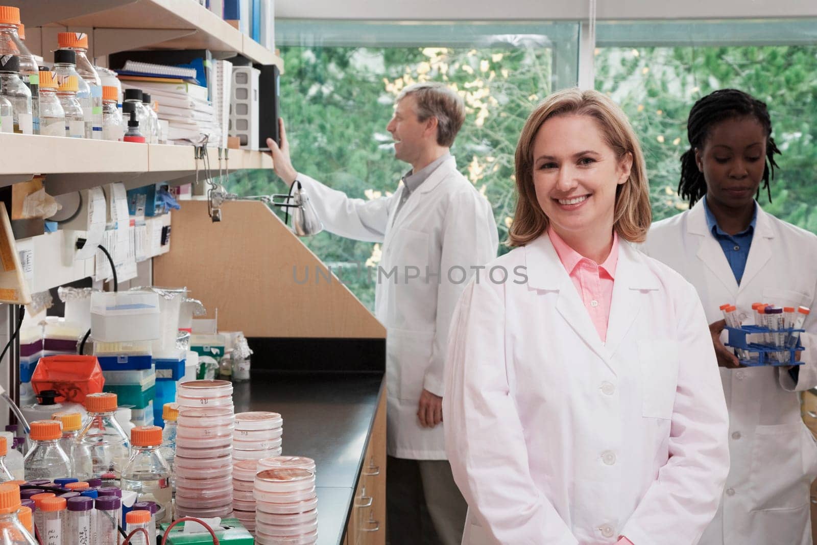 Three doctors working in a laboratory