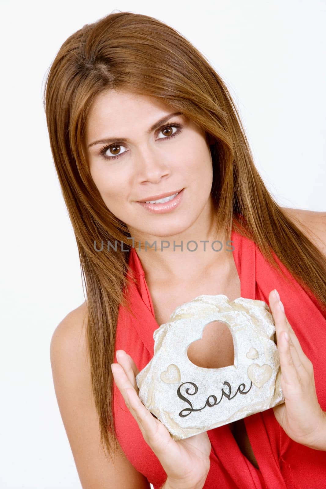 Portrait of a woman holding a gift