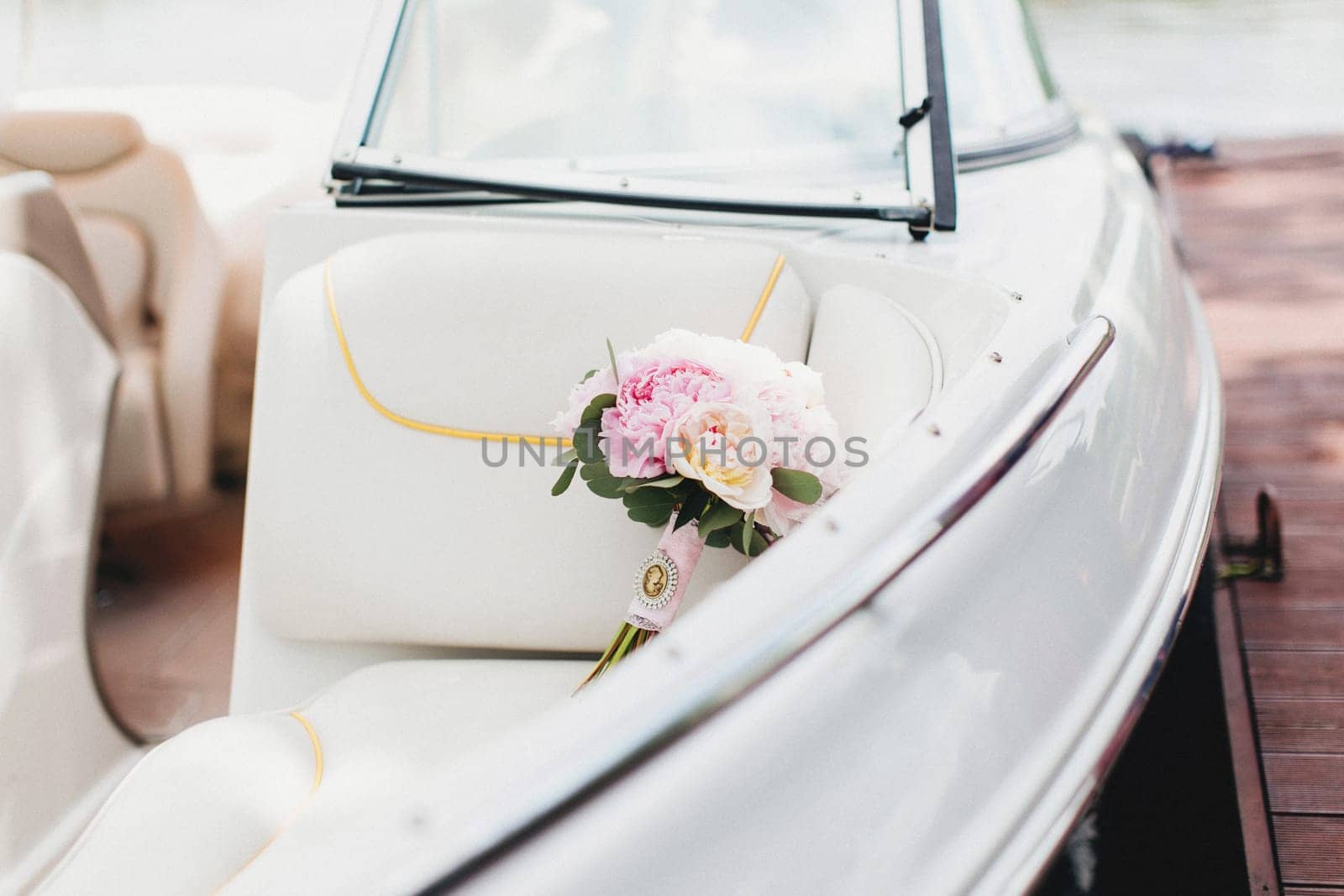 Luxury wedding bouquet in the white boat. High quality photo