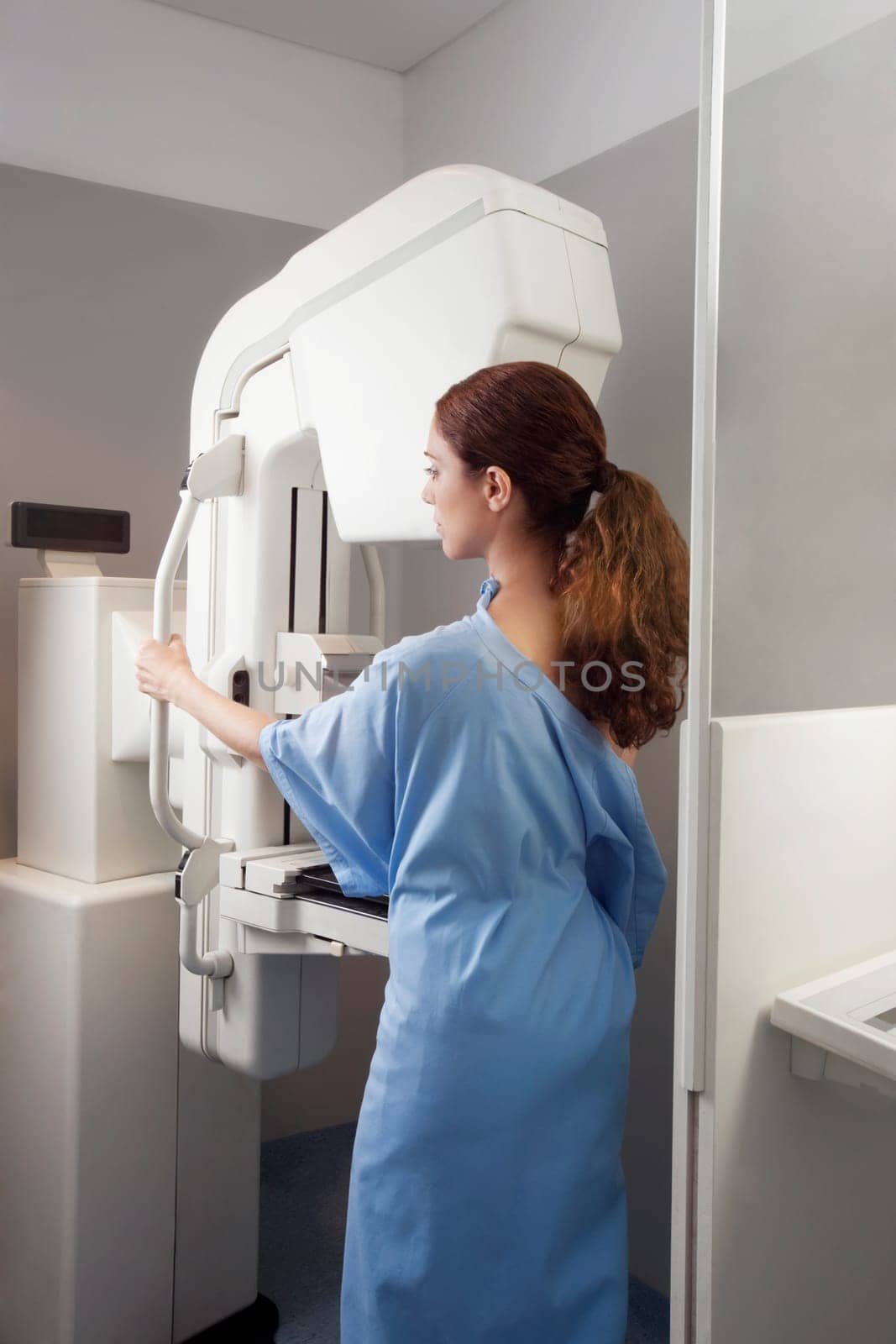 Woman getting mammogram