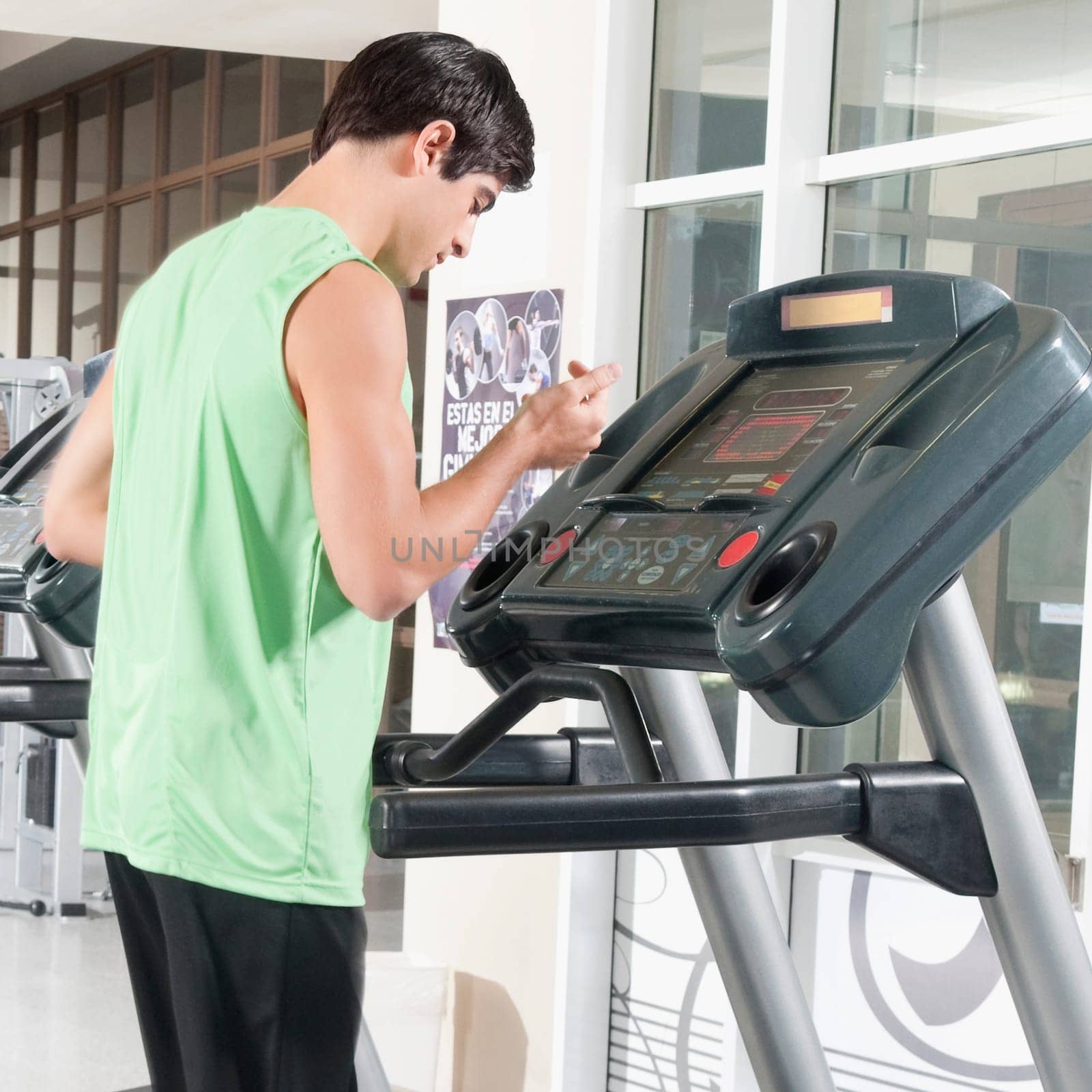 Man standing on a treadmill