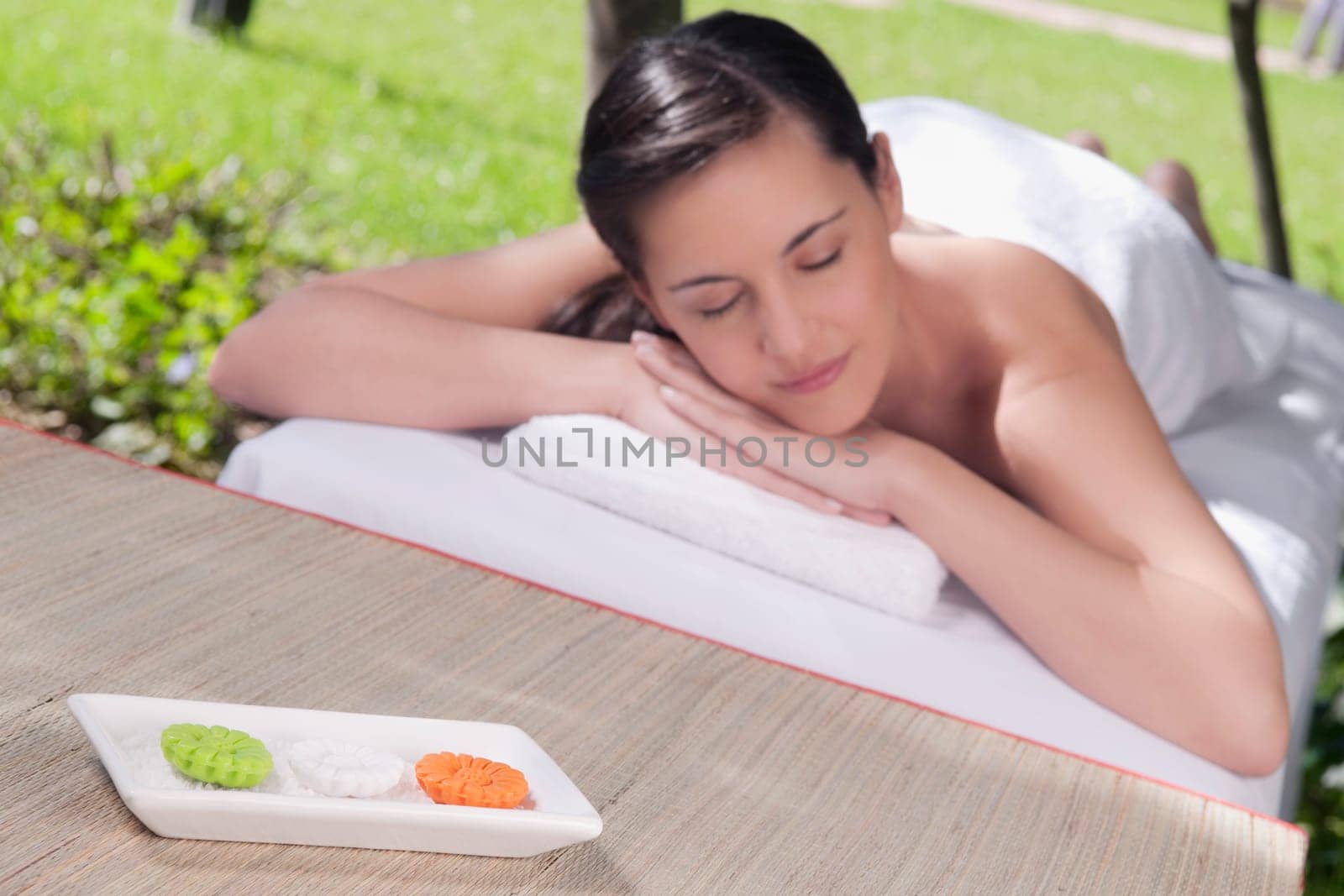 Woman lying on a massage table