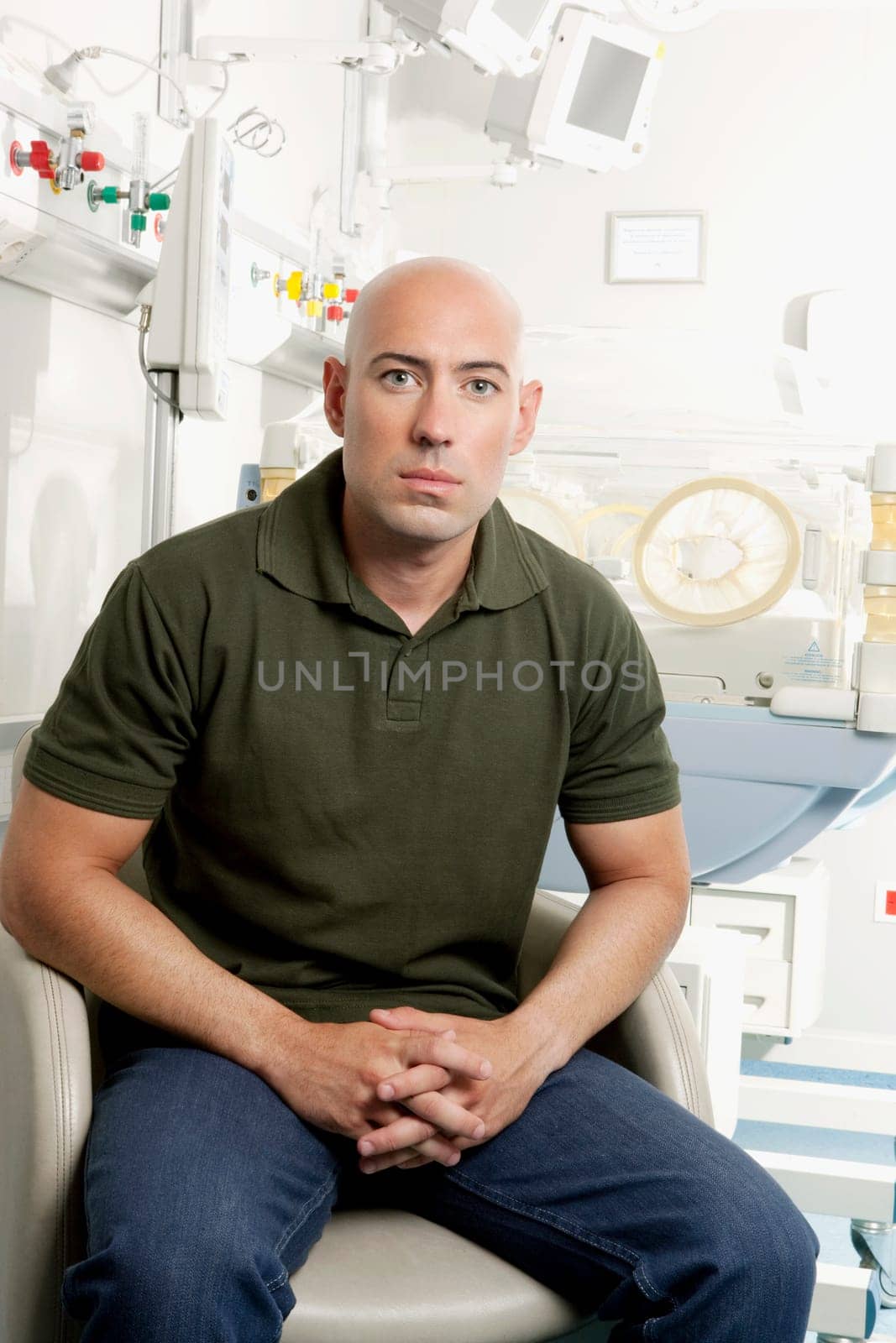 Man sitting in a hospital ward