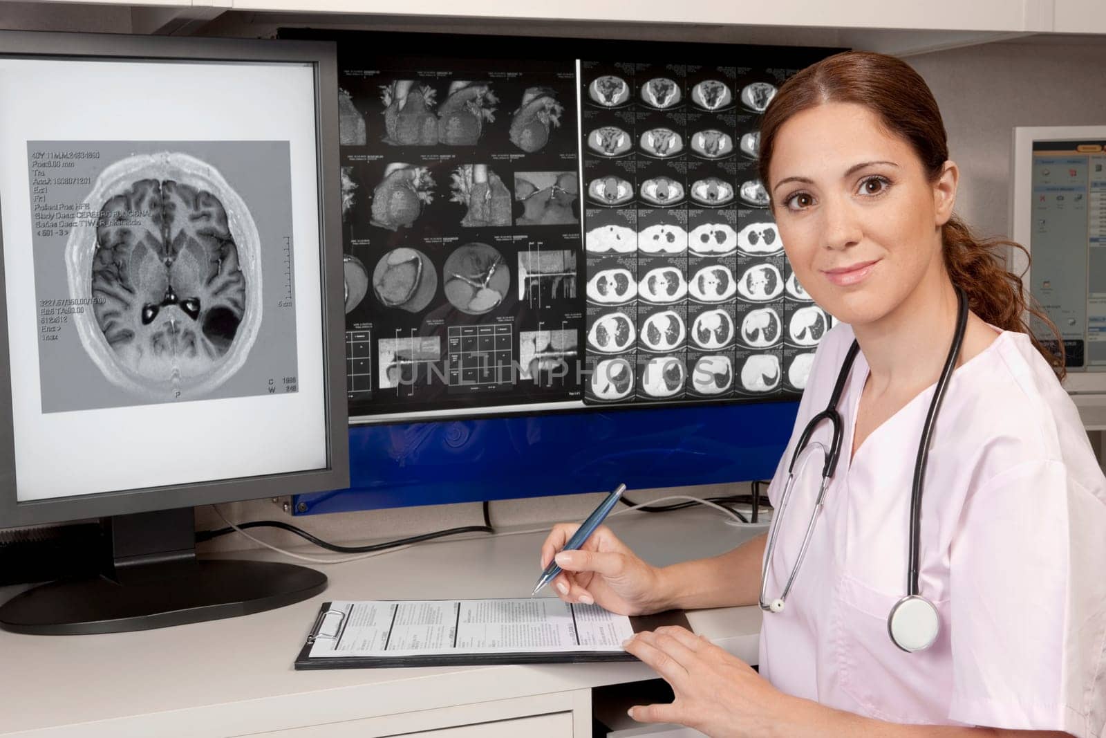 Portrait of a female doctor with MRI report