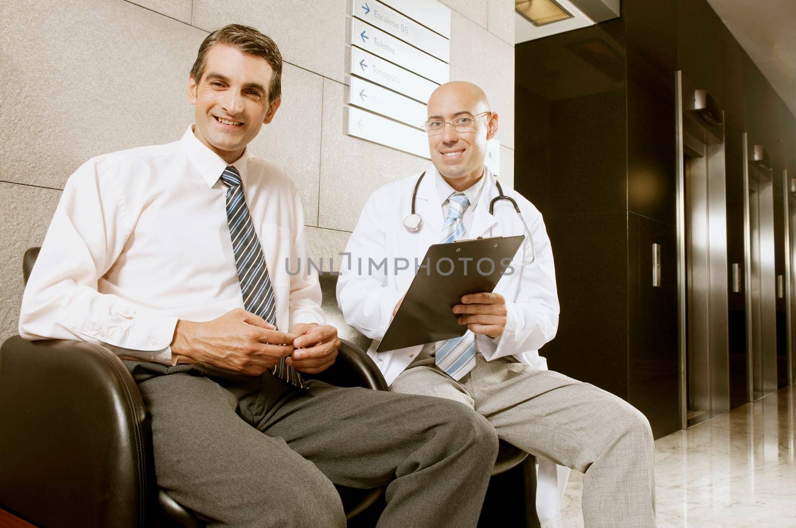 Portrait of two doctors smiling