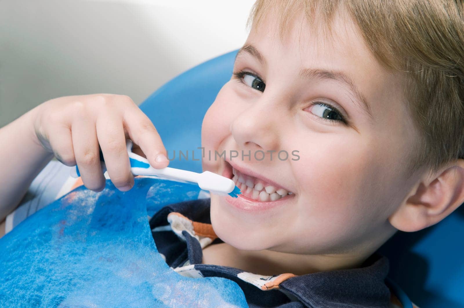 Boy brushing teeth
