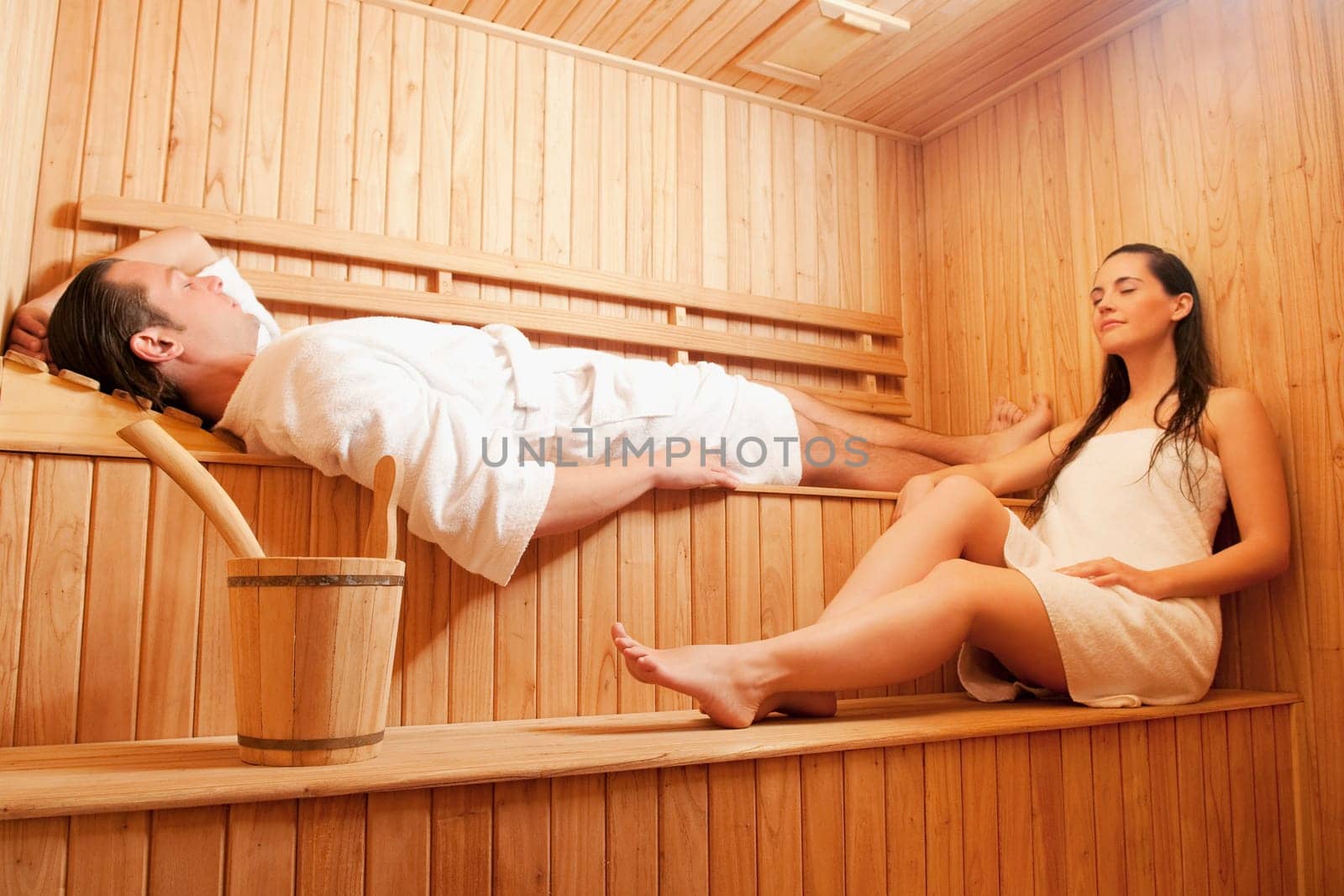 Couple taking a sauna bath