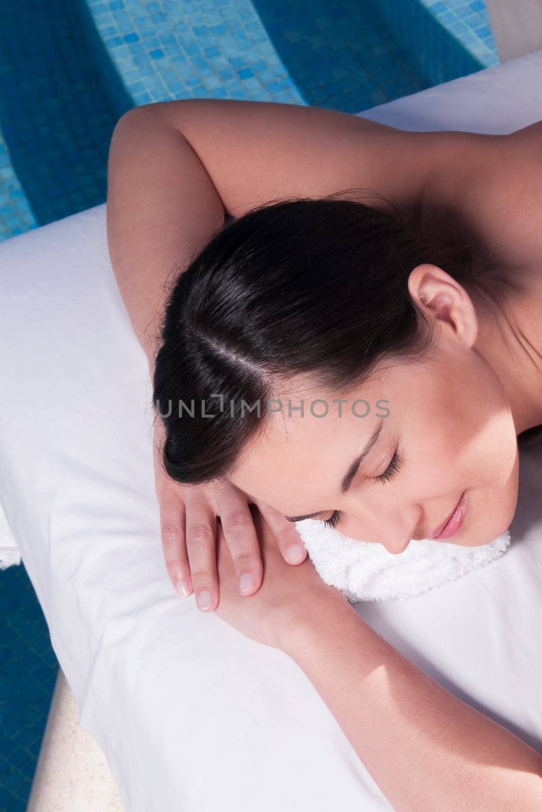 Woman lying on a massage table