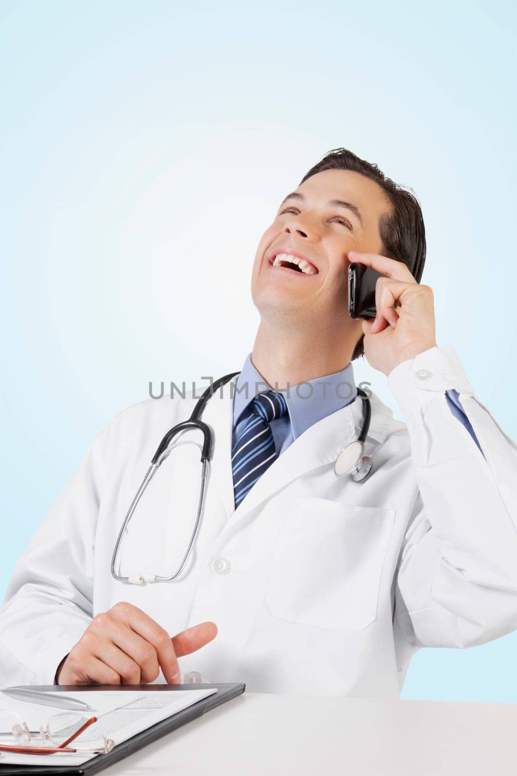 Doctor talking on a mobile phone