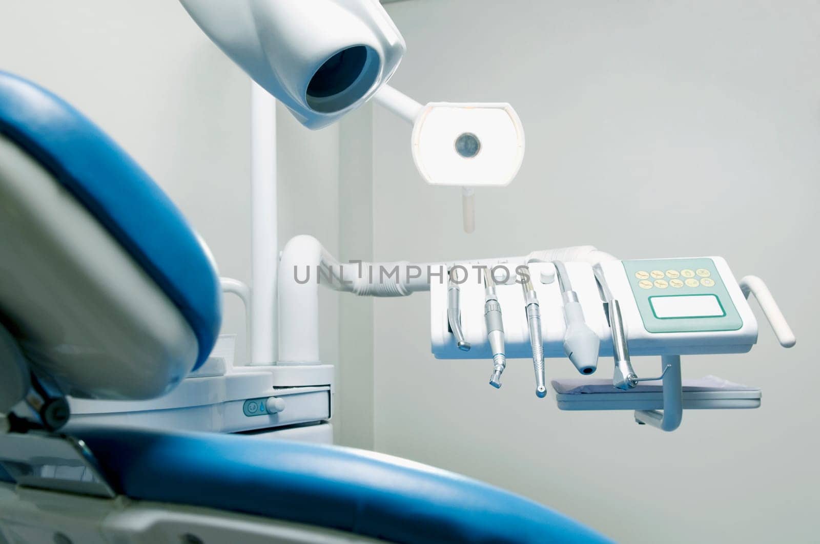 DentistŽs chair with dental equipments in an examination room