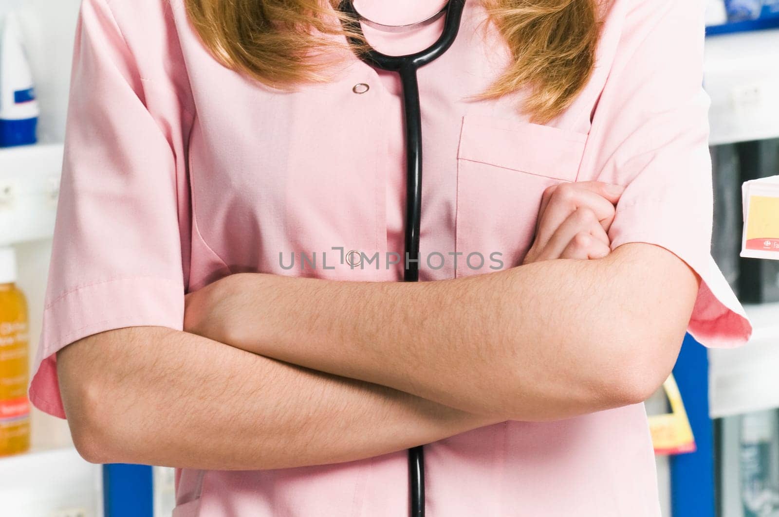 Mid section view of a female pharmacist