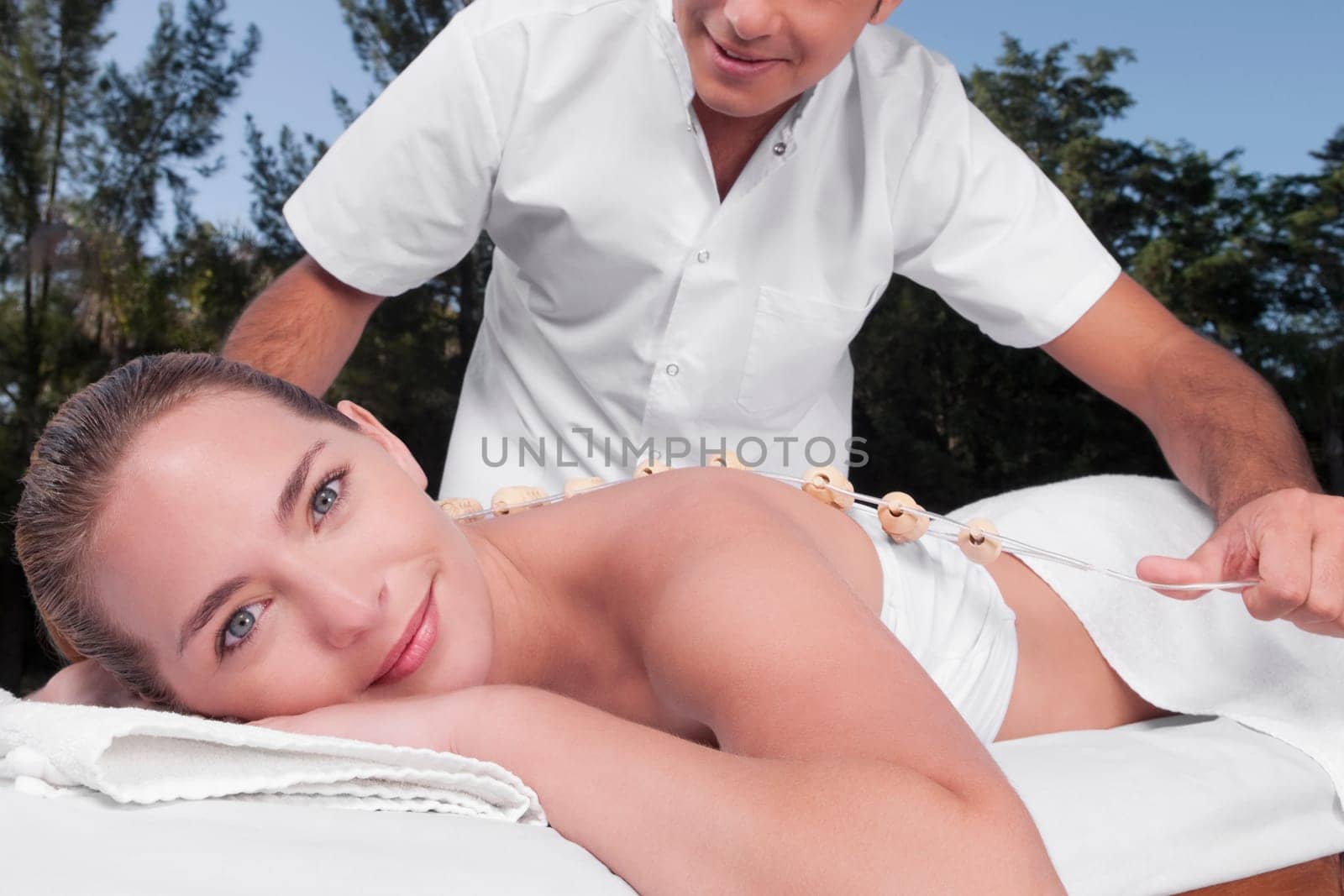 Woman receiving acupressure treatment