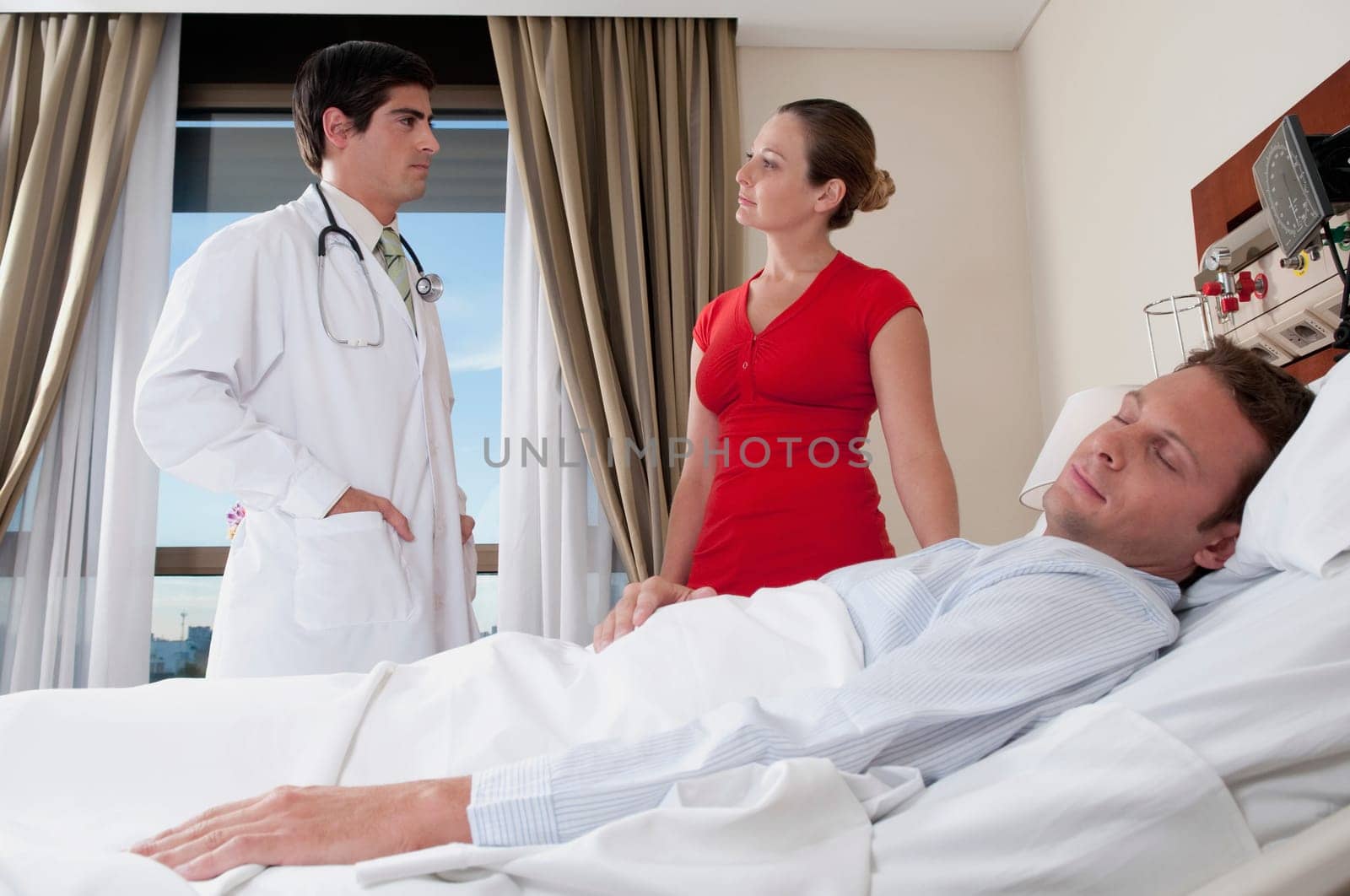 Woman discussing with a doctor