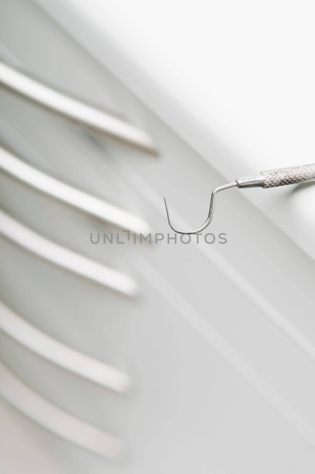 Close_up of a dental scaler in an examination room