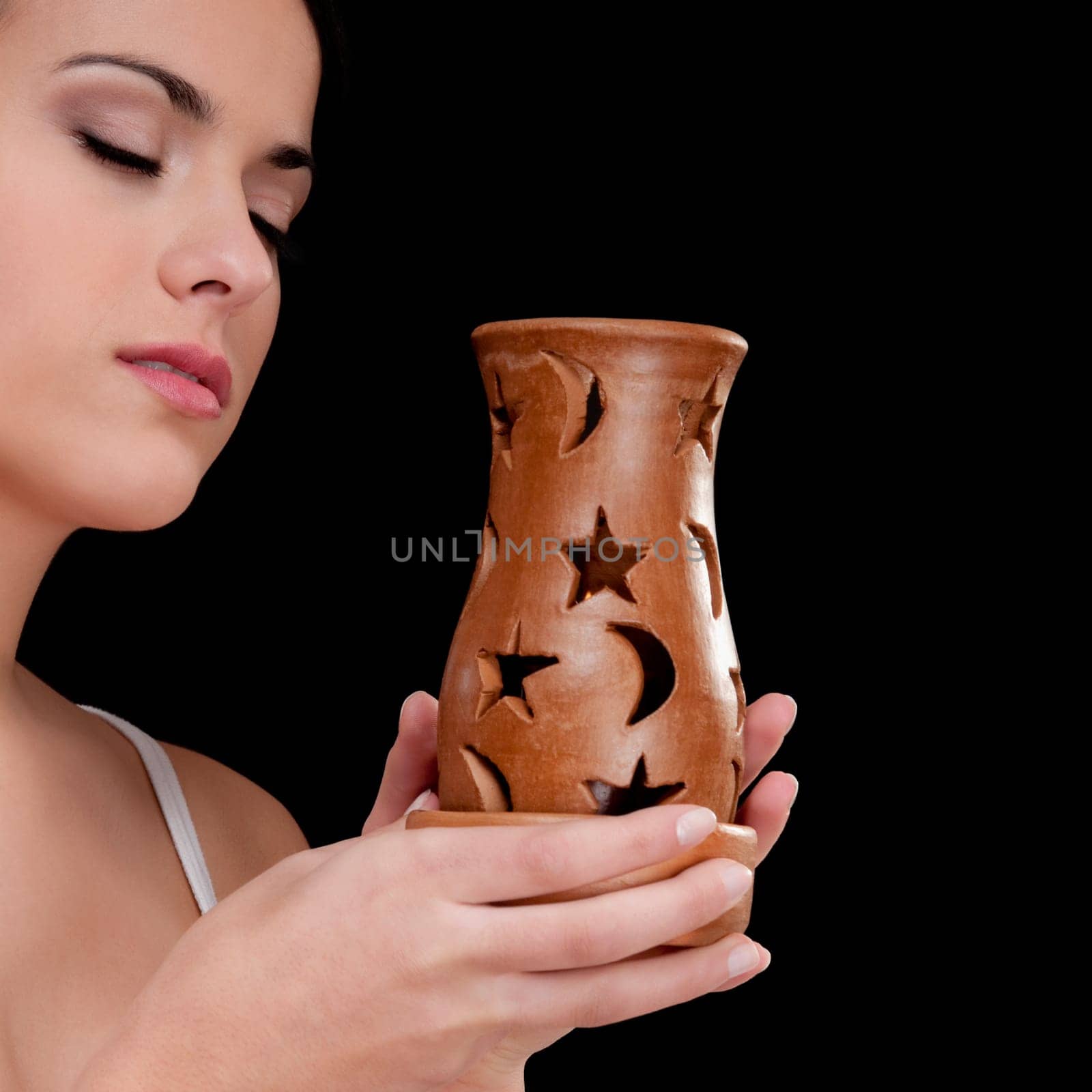 Woman holding an incense burner