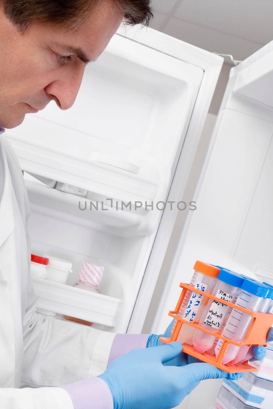Doctor holding medical samples in a laboratory