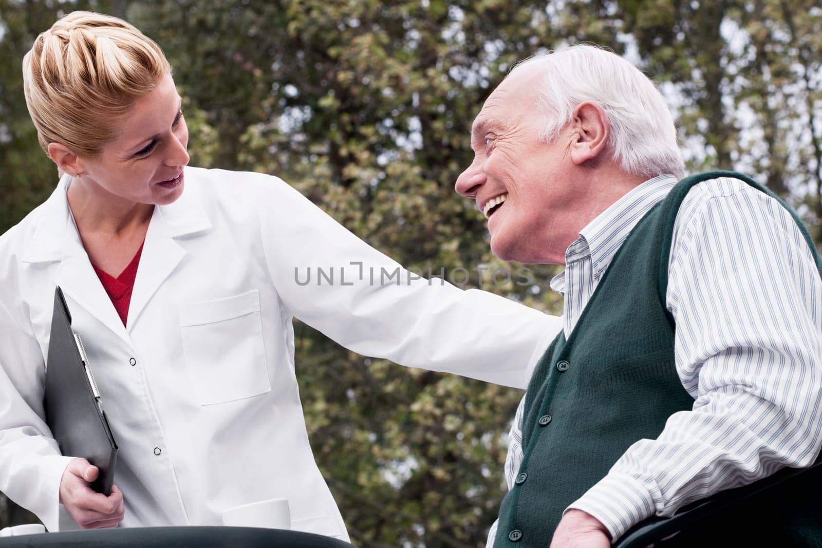 Man smiling with a doctor