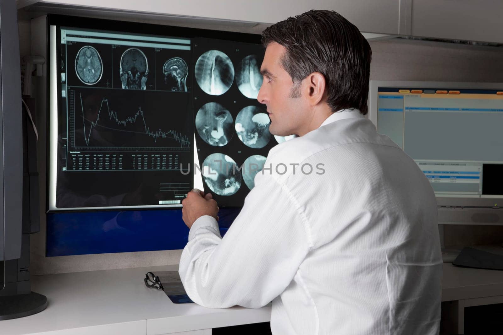 Doctor examining MRI report