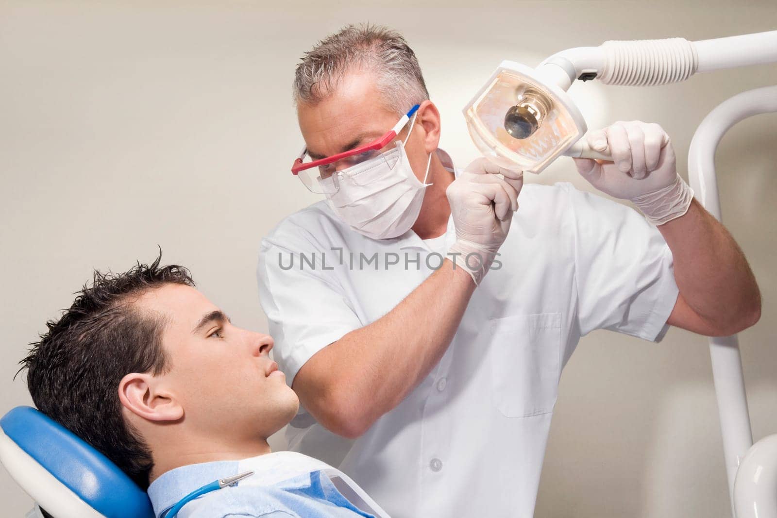 Dentist examining a patient