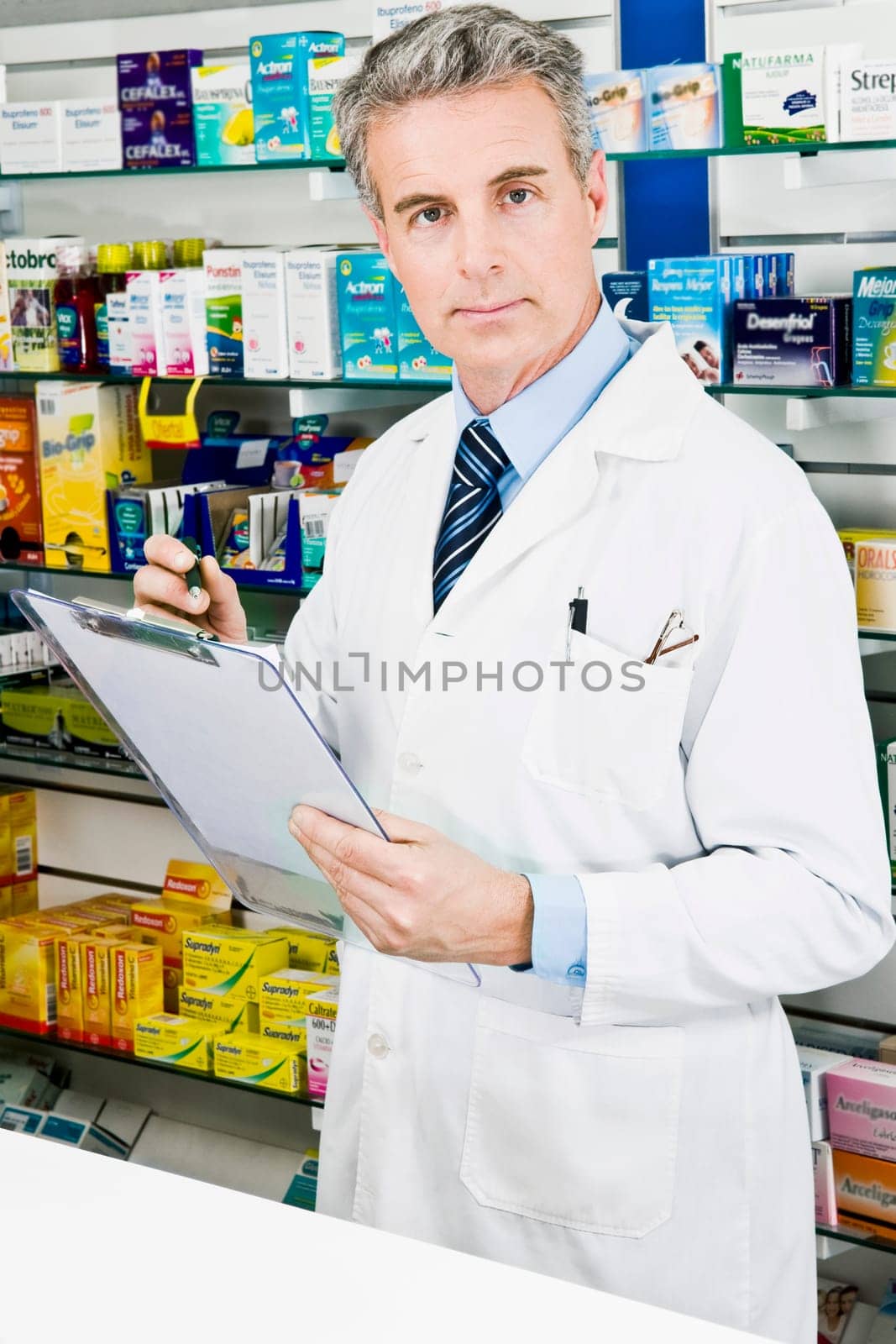Portrait of a pharmacist holding a clipboard