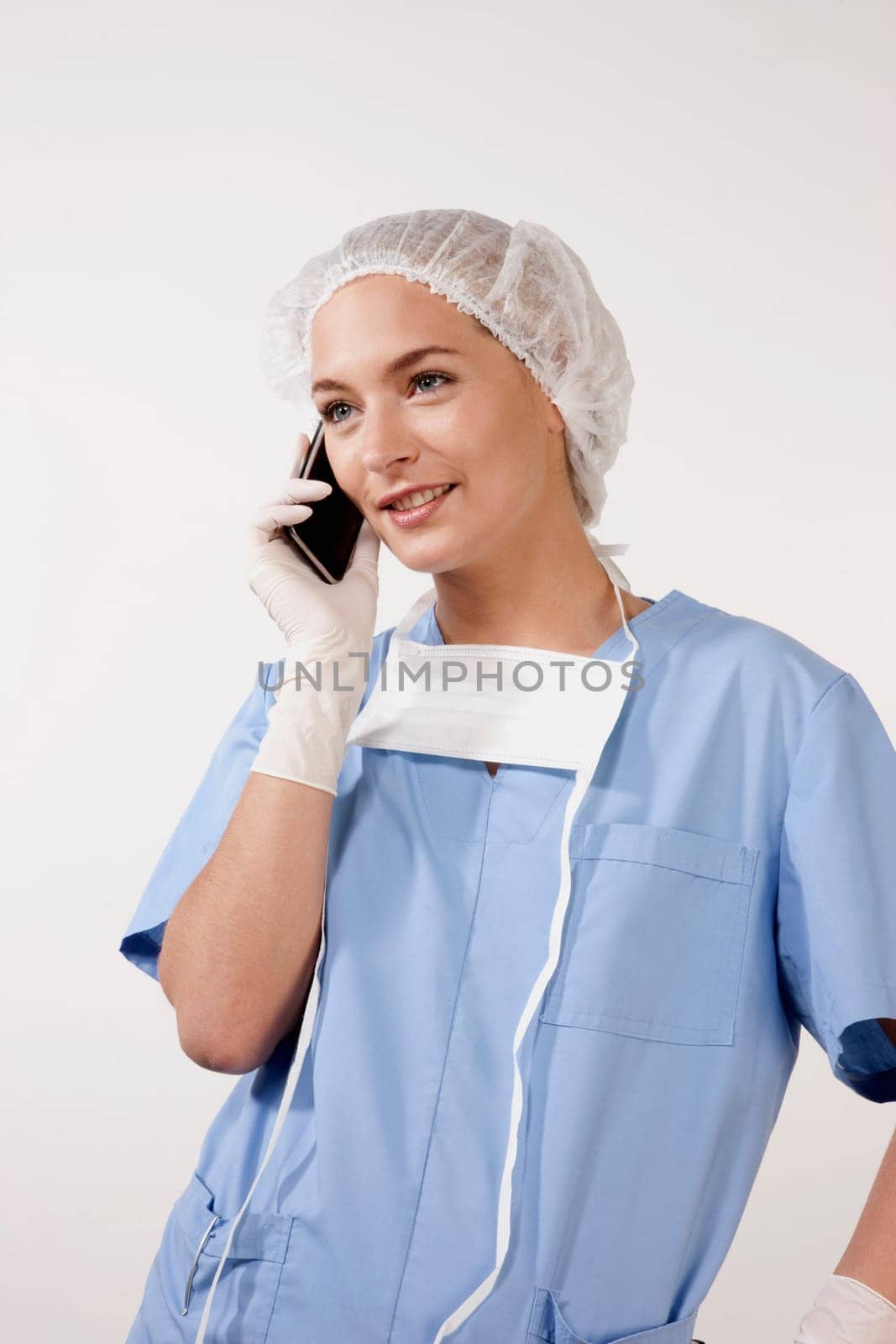 Female nurse talking on a mobile phone