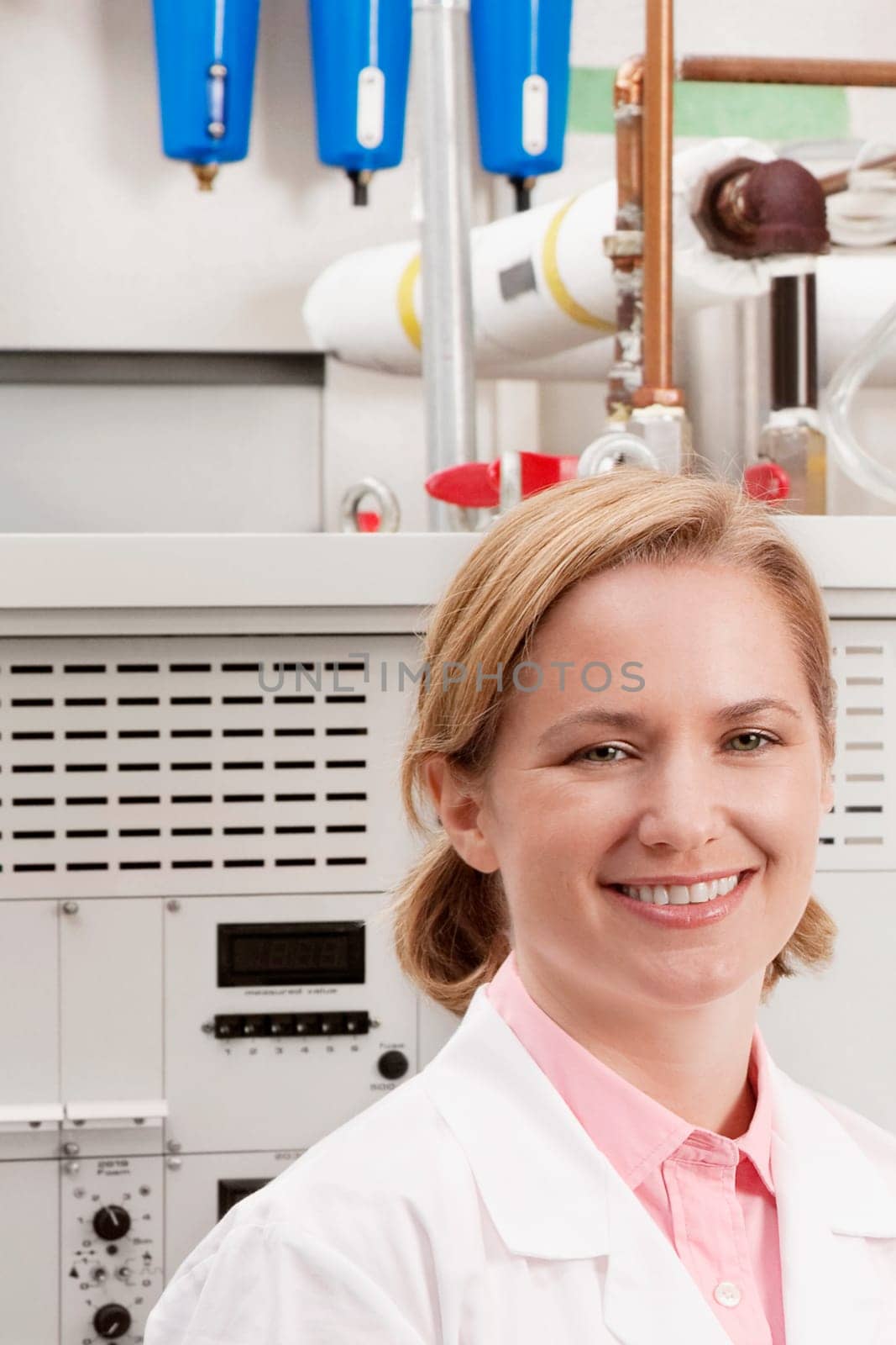 Portrait of a female doctor smiling in a laboratory