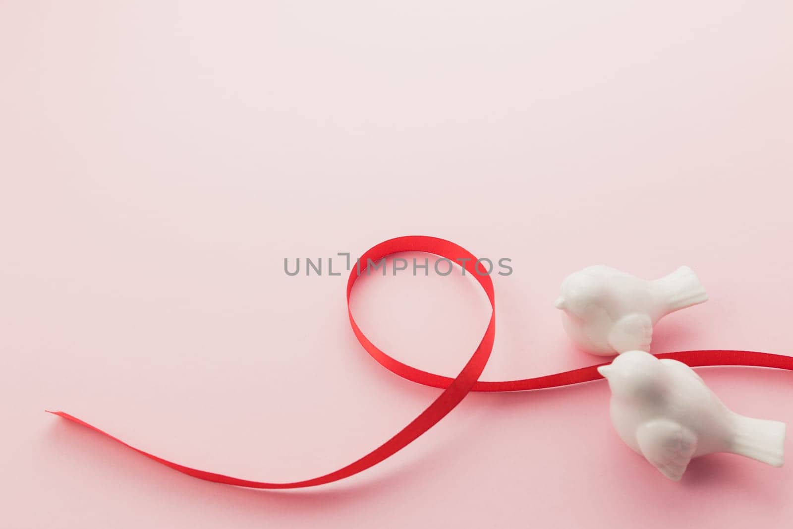 Valentine on the pink background. Love for two. High quality photo