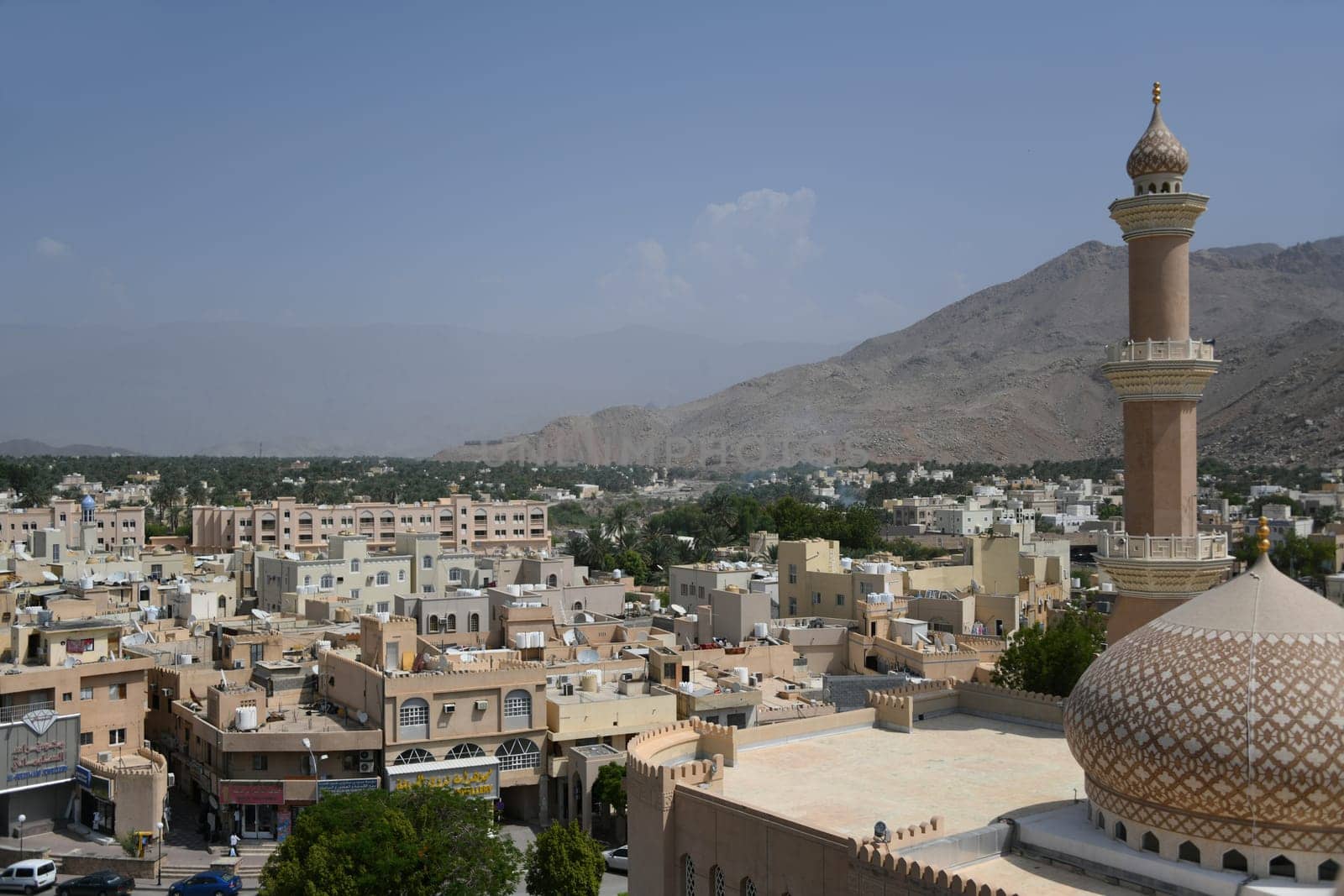 The oasis city of Nizwa is located at the foot of the Hajar Mountains and in the heart of Oman on the Arabian Peninsula.