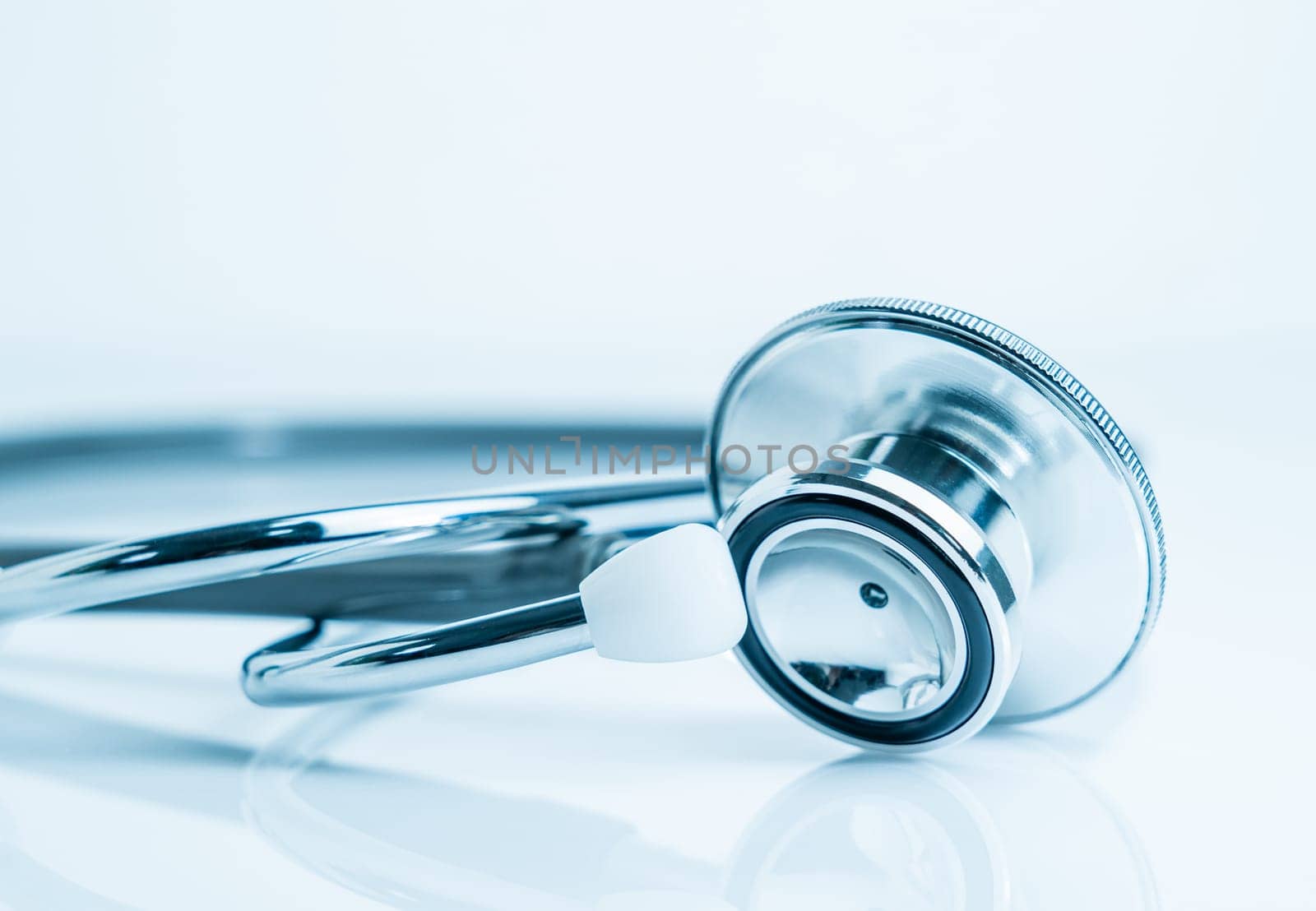 Stethoscope for doctor checkup in health medical laboratory table as medical concept