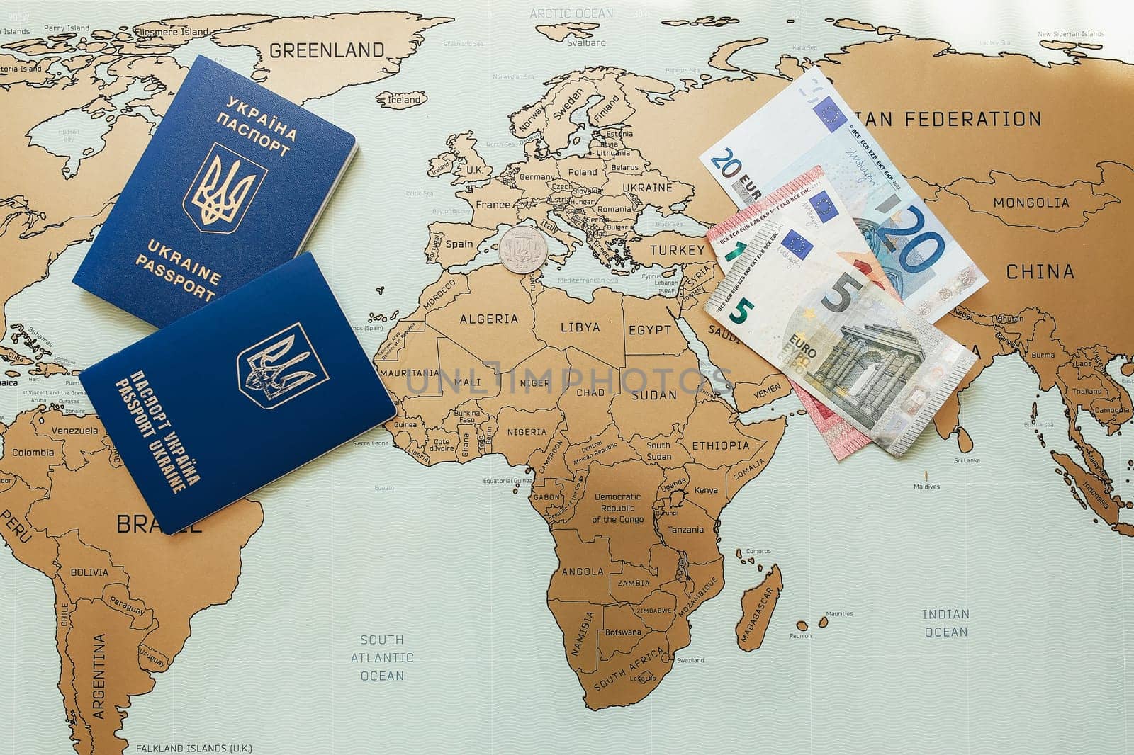 Ukrainian passports on the travelling map. High quality photo
