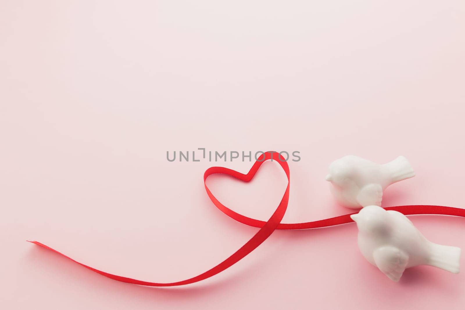 Valentine on the pink background. Love for two. High quality photo