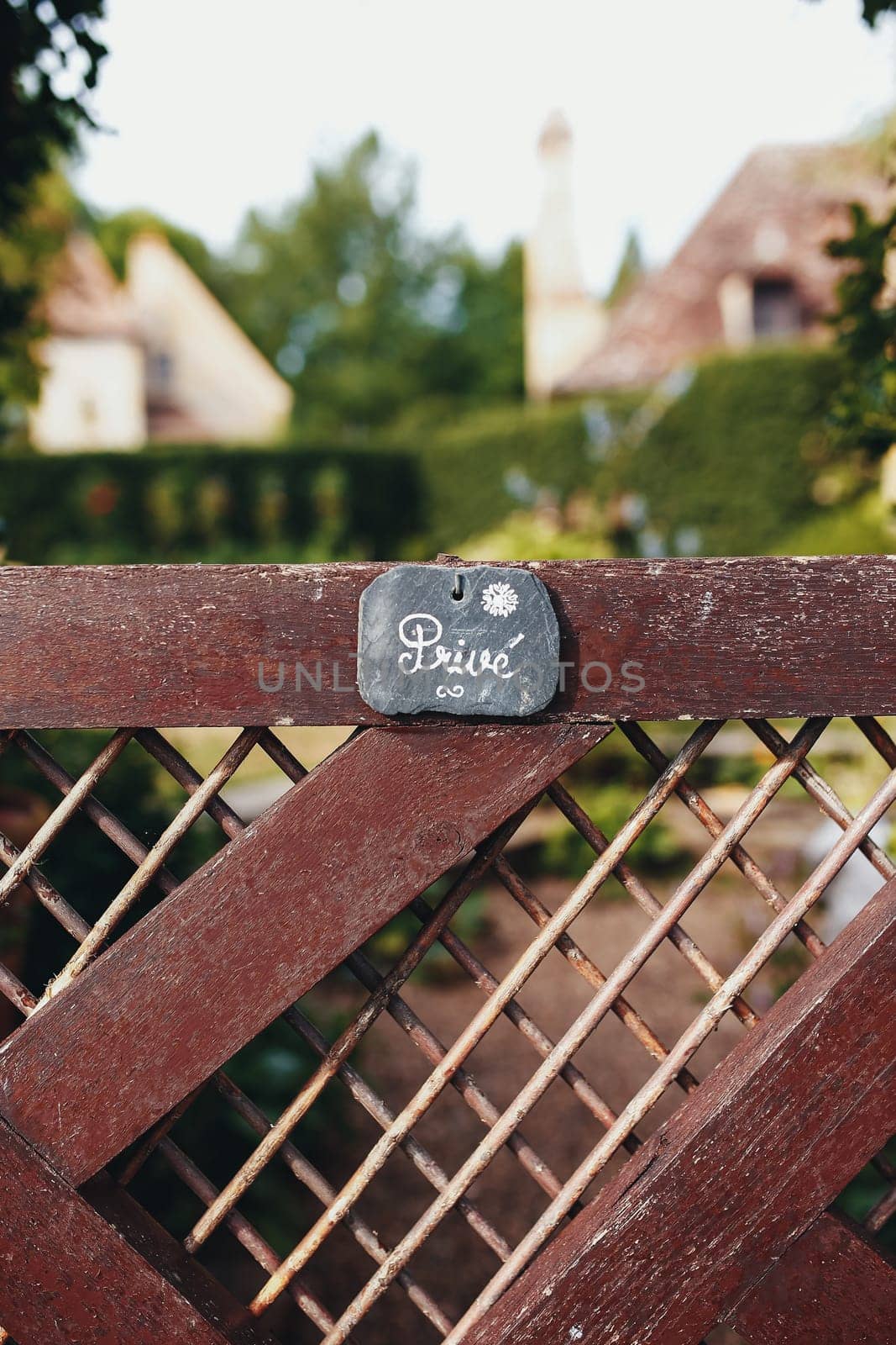 Fence of private house with private badge. High quality photo