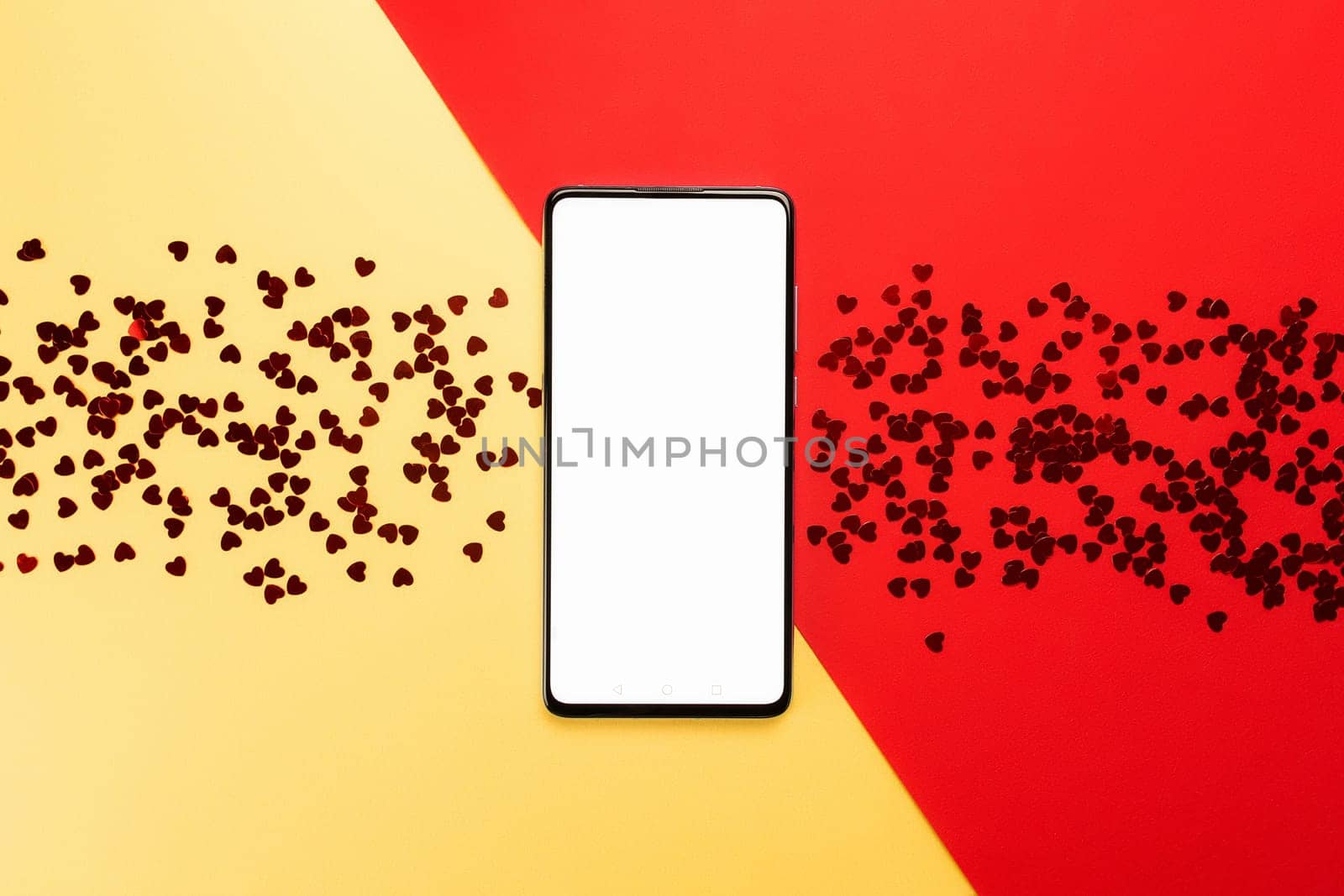 Valentine card with empty phone screen and glitters. High quality photo