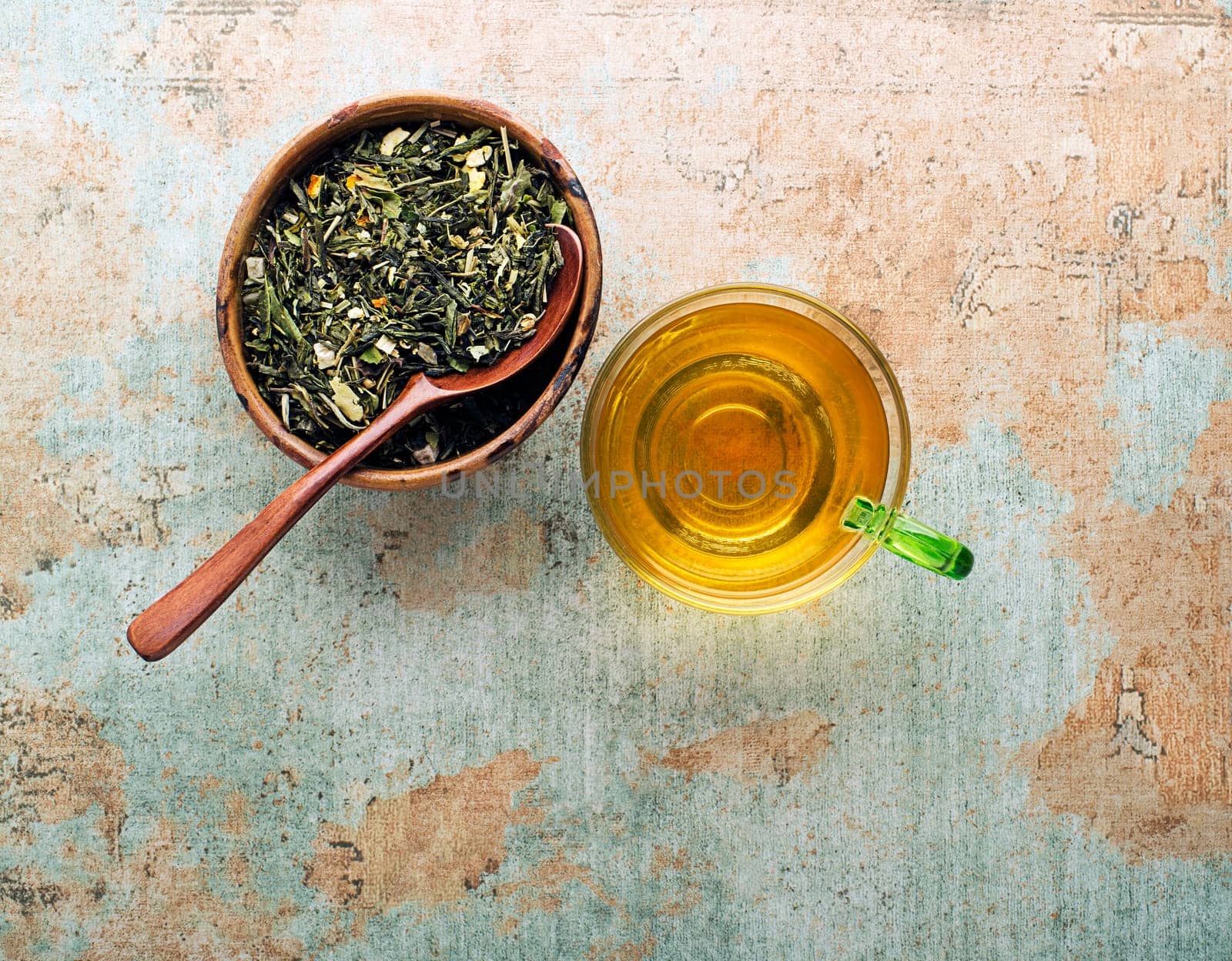 Tea cup with green tea leaves. Healthy concept